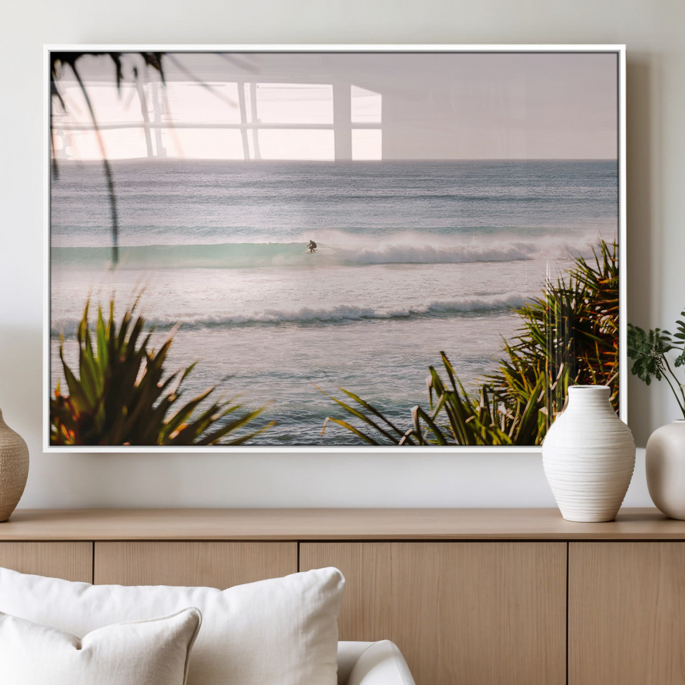 Canvas of a lone surfer riding a pastel wave at sunrise, perfect for tropical or coastal-themed spaces with a relaxed, airy vibe.
