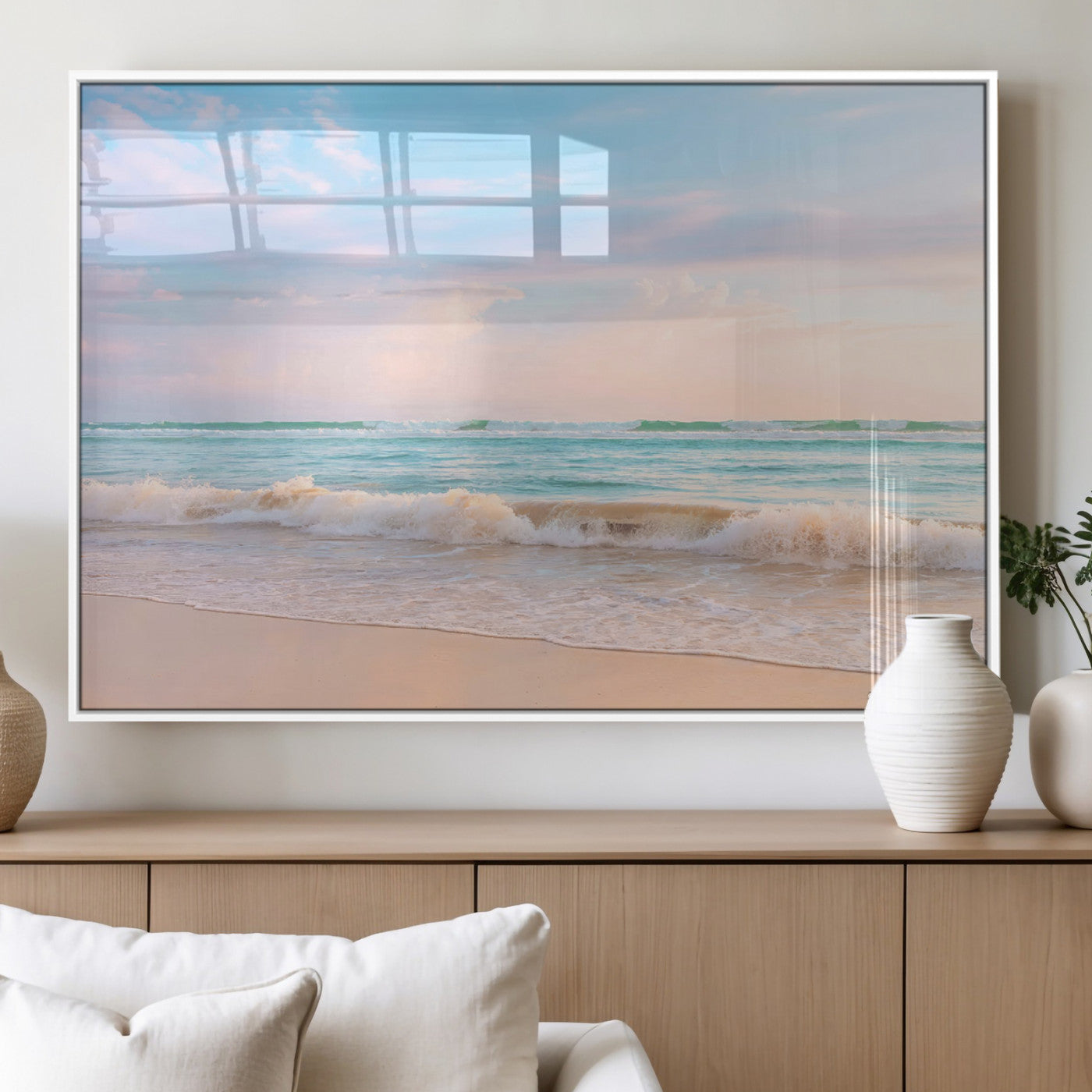 A peaceful beach scene with soft pastel skies, gentle waves washing up on the sandy shore, creating a calm and serene ocean view.