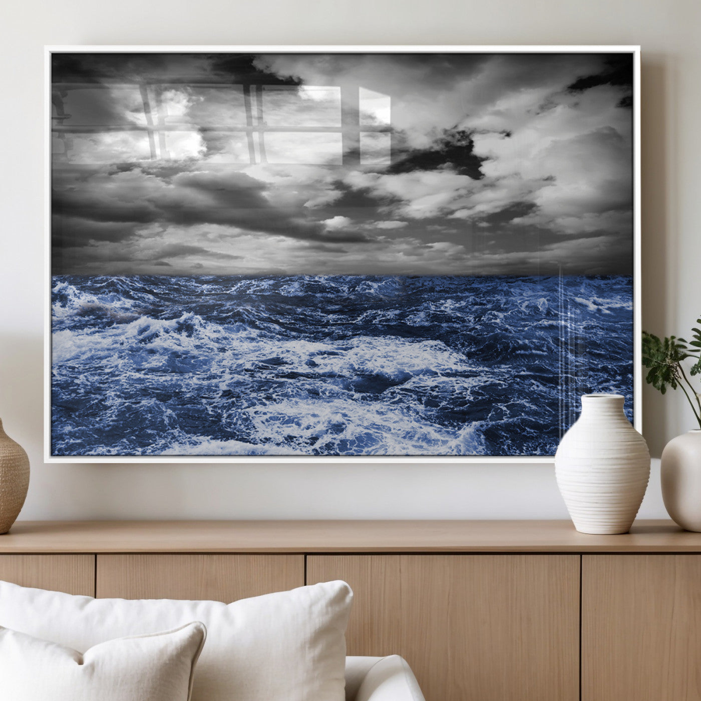 Moody canvas wall art of a stormy ocean under a dramatic black-and-white sky, perfect for bold or coastal-style interiors.