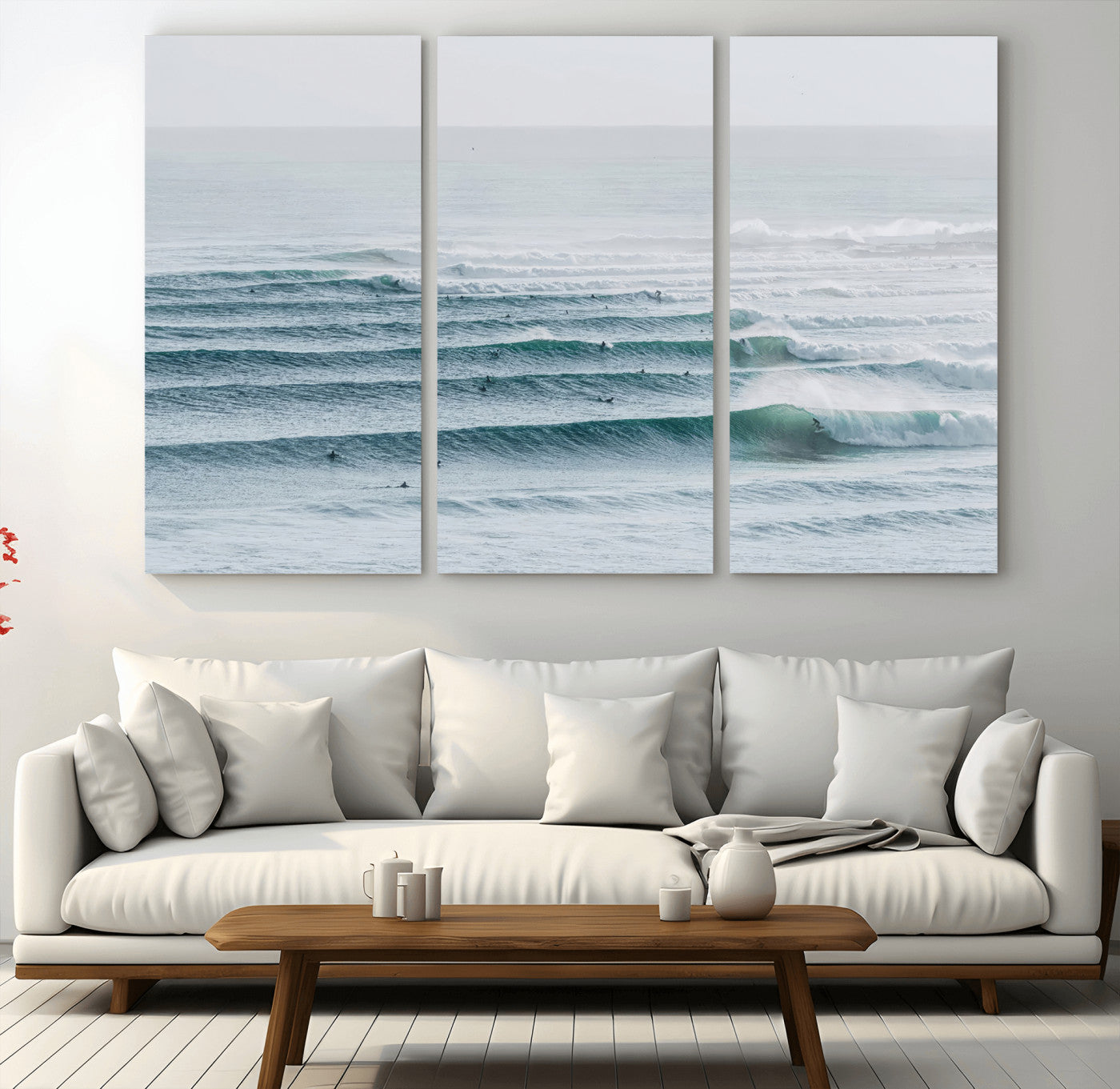High-angle view of surfers lining up across layered ocean waves, ideal for minimal coastal or surf-inspired room decor.