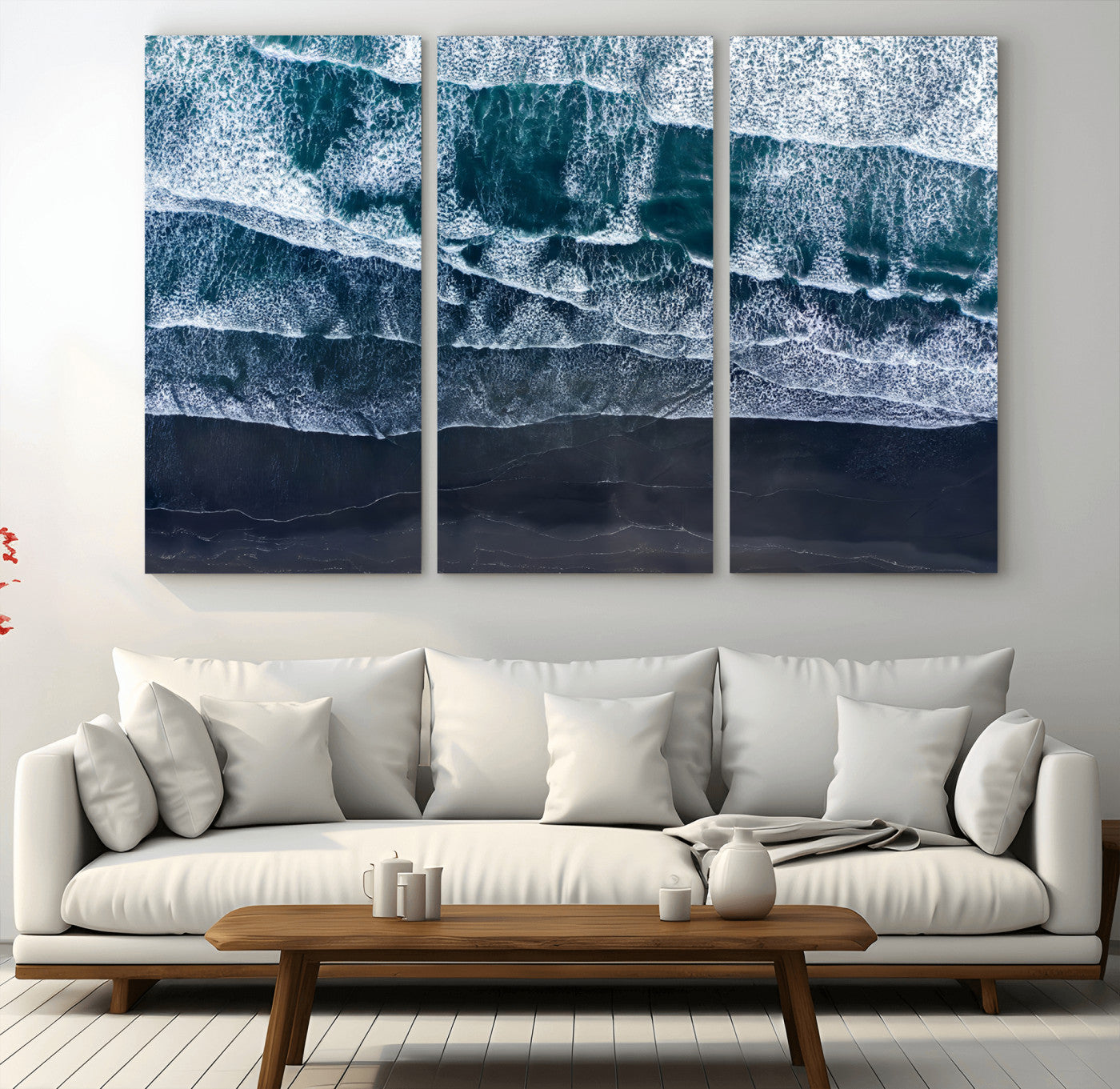 Canvas of aerial ocean waves crashing onto a black sand beach in moody tones, ideal for modern coastal or minimalist home decor.