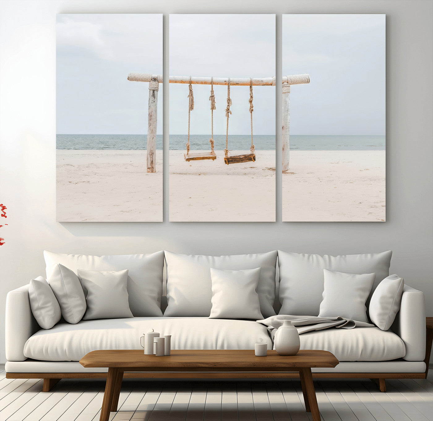 A rustic wooden beach swing stands on a serene sandy shore with an ocean horizon in the background, creating a tranquil and dreamy coastal escape.