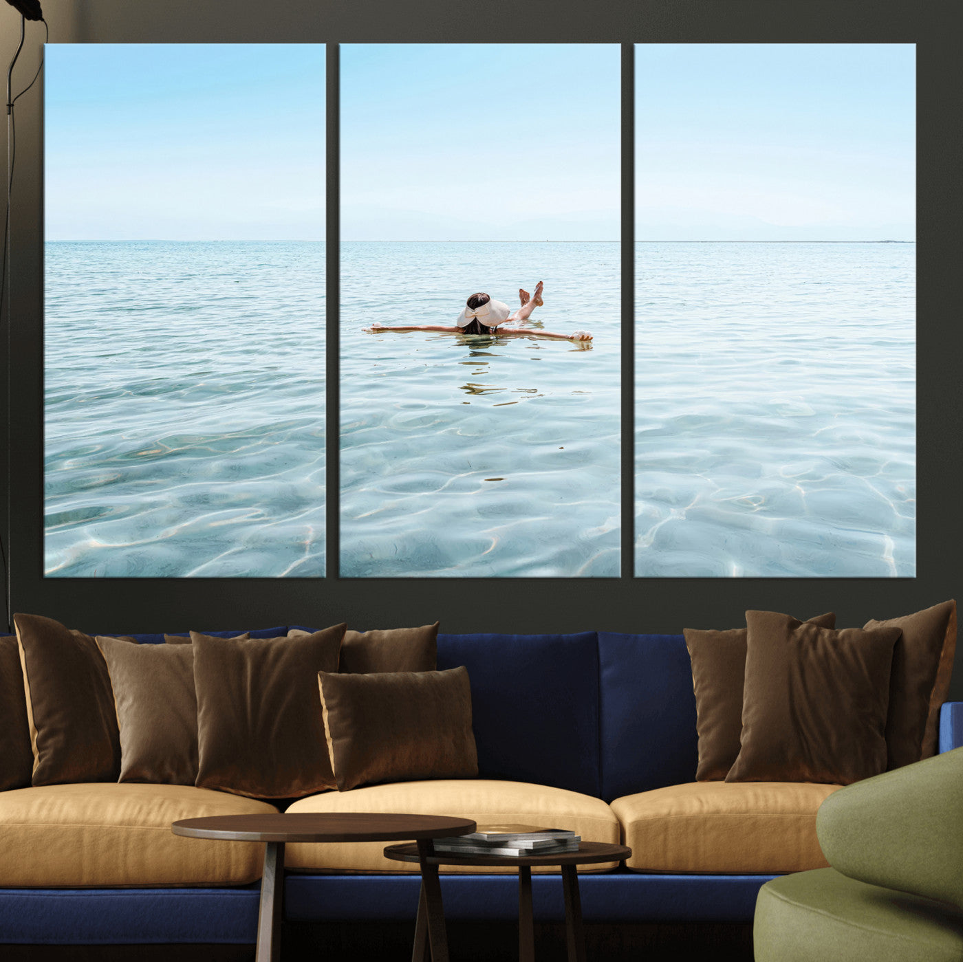A peaceful minimalist scene of a person floating on crystal-clear water, surrounded by a vast open horizon, capturing relaxation and serenity in a tranquil aquatic setting.