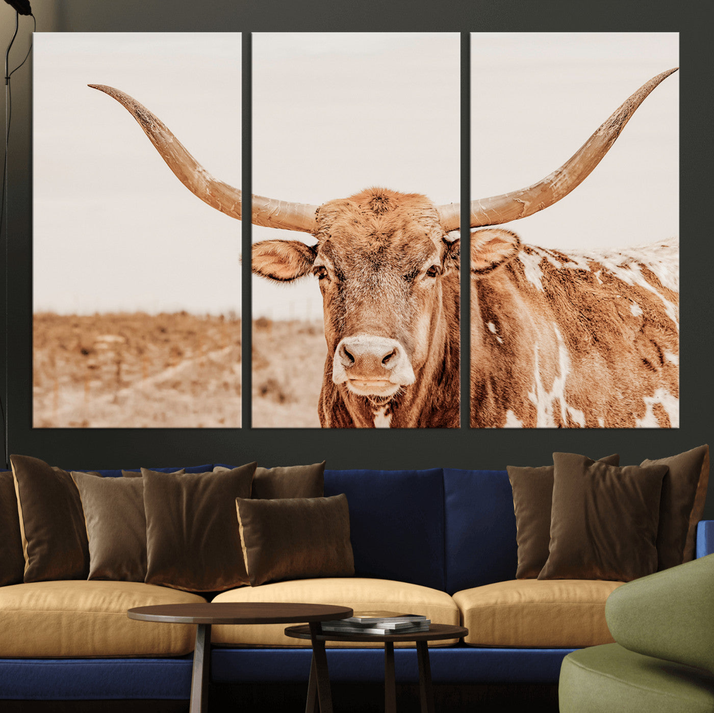 A longhorn bull standing proudly in a sunlit desert field with warm neutral tones, ideal for rustic western or farmhouse interiors.