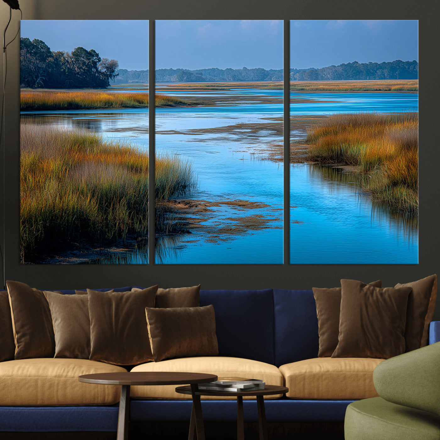 A peaceful marshland scene with calm blue water reflecting the surrounding grasses and trees, capturing the beauty of nature in a serene landscape.
