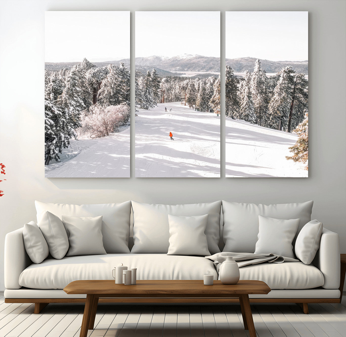 Bright ski trail lined with snow-covered pines and a skier in orange, perfect for alpine adventure or winter sports-inspired decor.