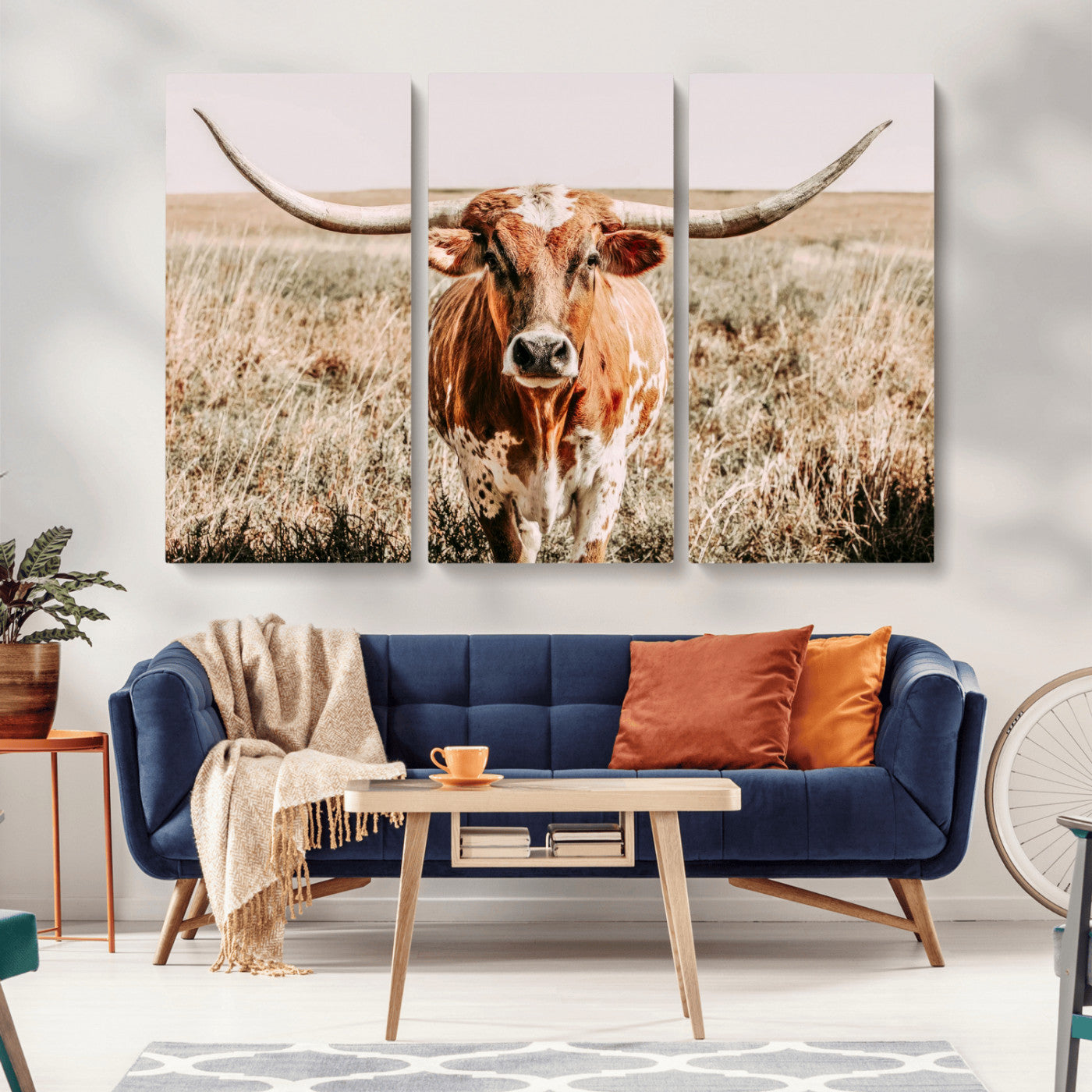 Framed longhorn cow canvas wall art with rustic prairie background, western animal print perfect for farmhouse or ranch style decor