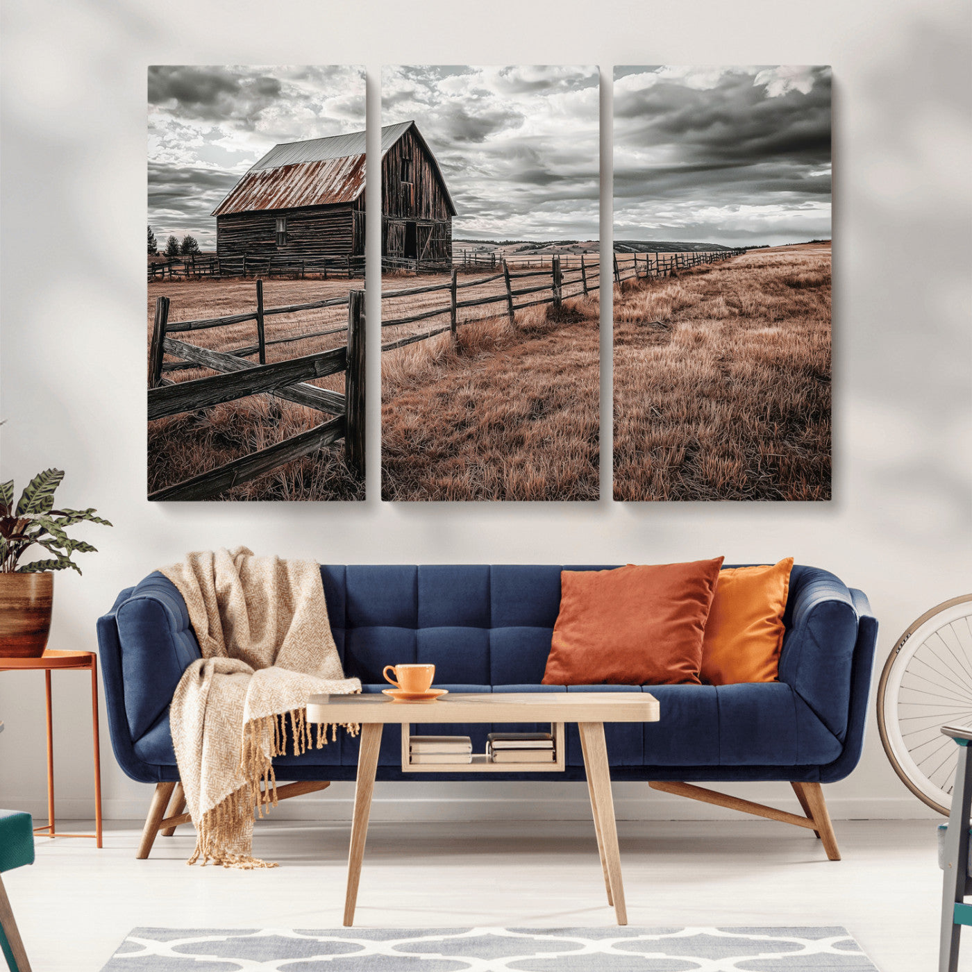 Framed canvas of a rustic barn under a moody sky with weathered fence and dark fields, ideal for farmhouse or rural-style wall decor.