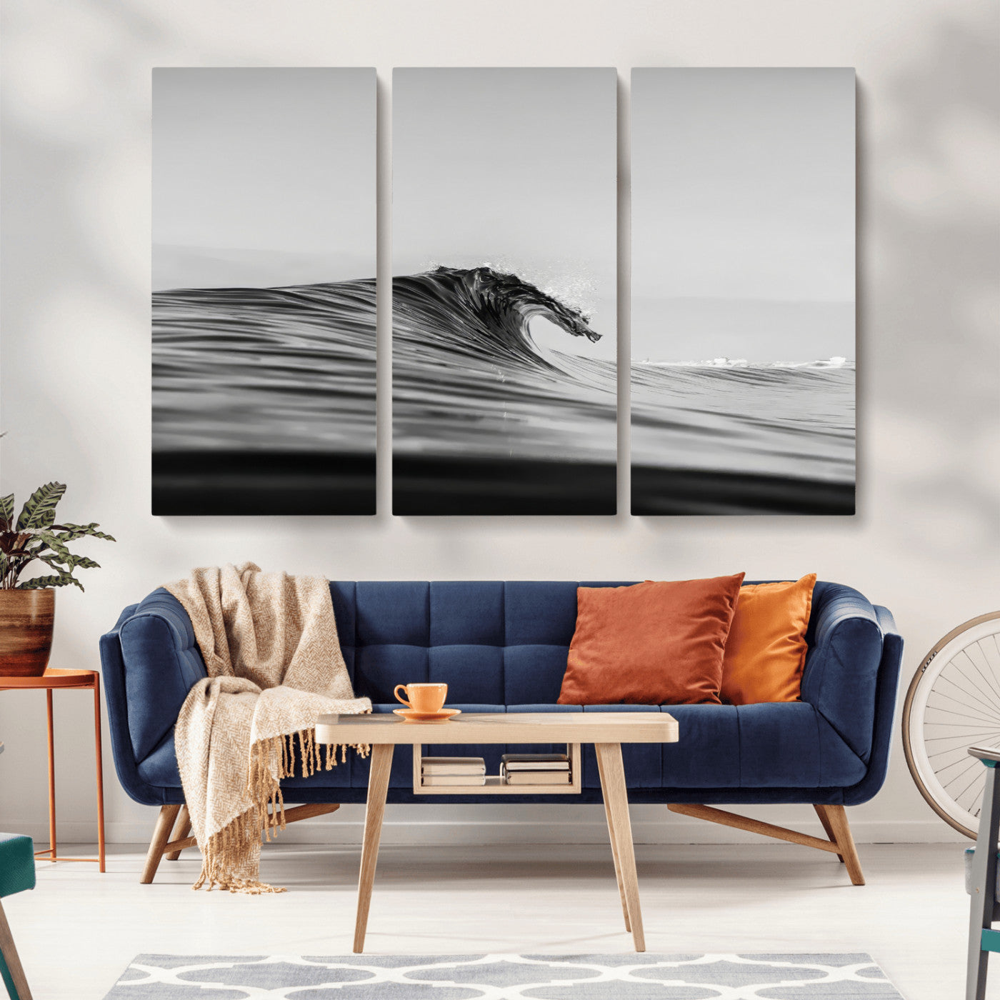 Striking black and white photo of a curling wave, ideal for modern coastal or minimalist wall decor settings.