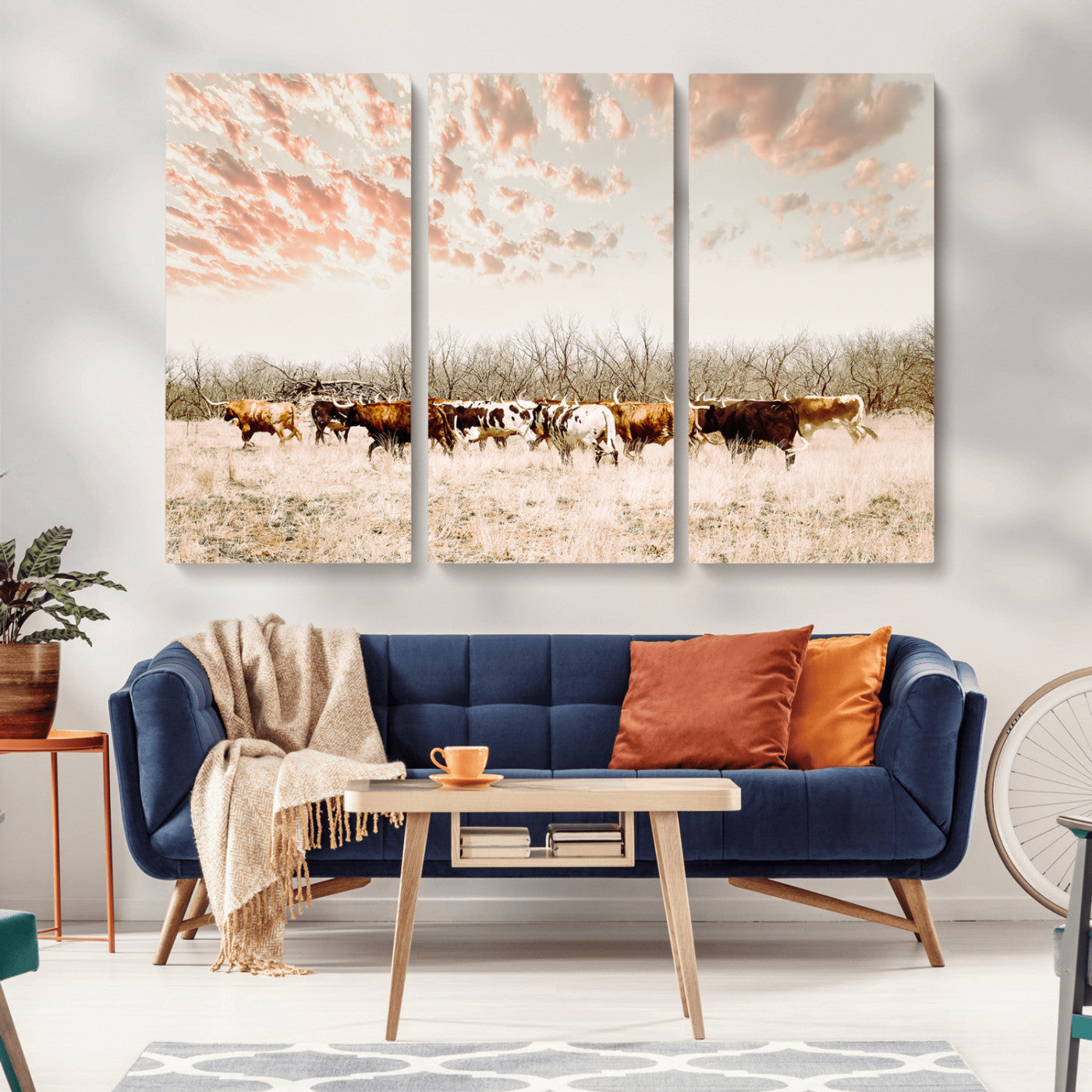 Cattle herd in a soft-toned field under a pastel pink sky, creating a peaceful rustic feel, perfect for farmhouse or western-themed spaces.