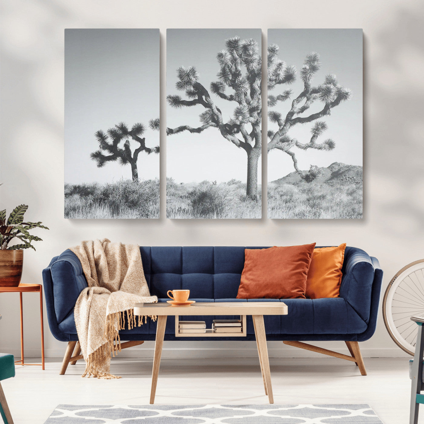 Black and white Joshua tree in a desert landscape with soft light and dry brush, perfect for rustic or minimalist home decor.