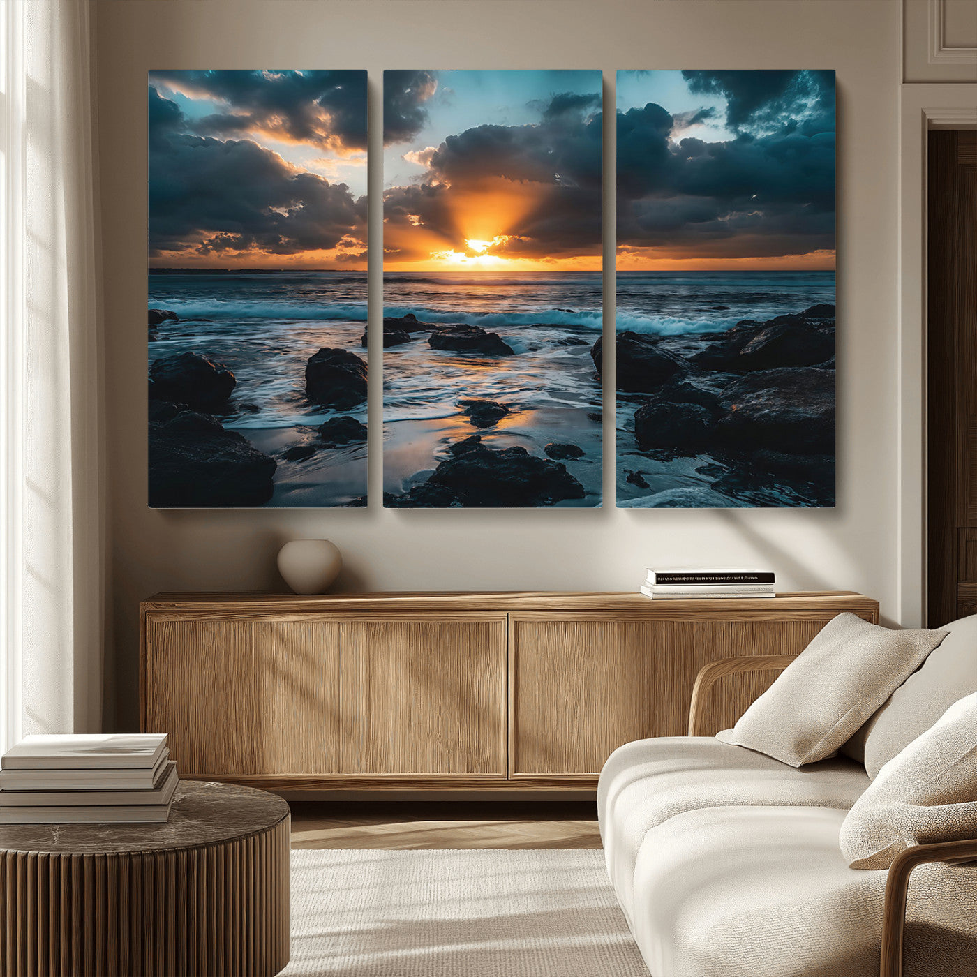An awe-inspiring sunset over the ocean with rays of light piercing through dramatic clouds, creating a beautiful seascape with rocks in the foreground.