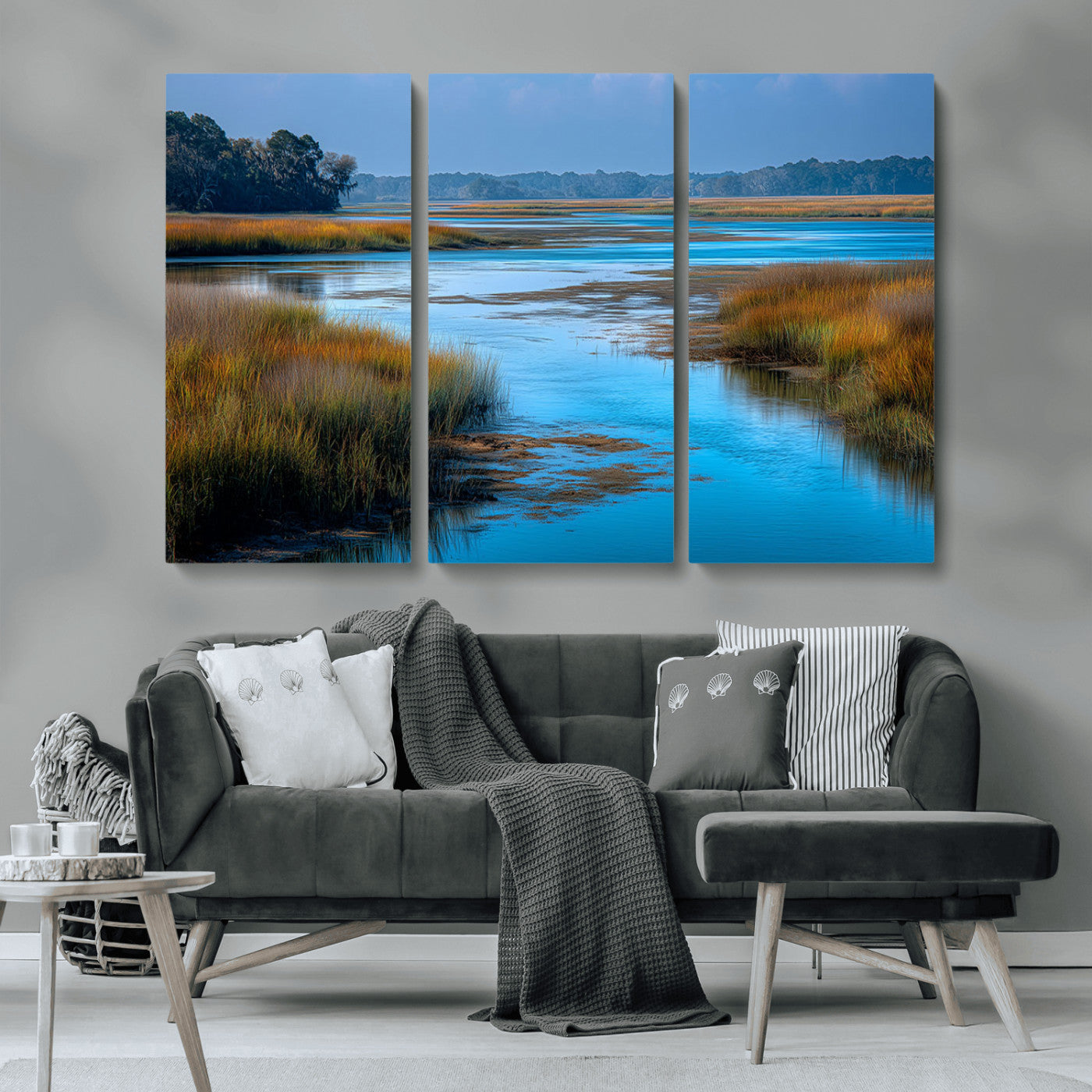 A peaceful marshland scene with calm blue water reflecting the surrounding grasses and trees, capturing the beauty of nature in a serene landscape.