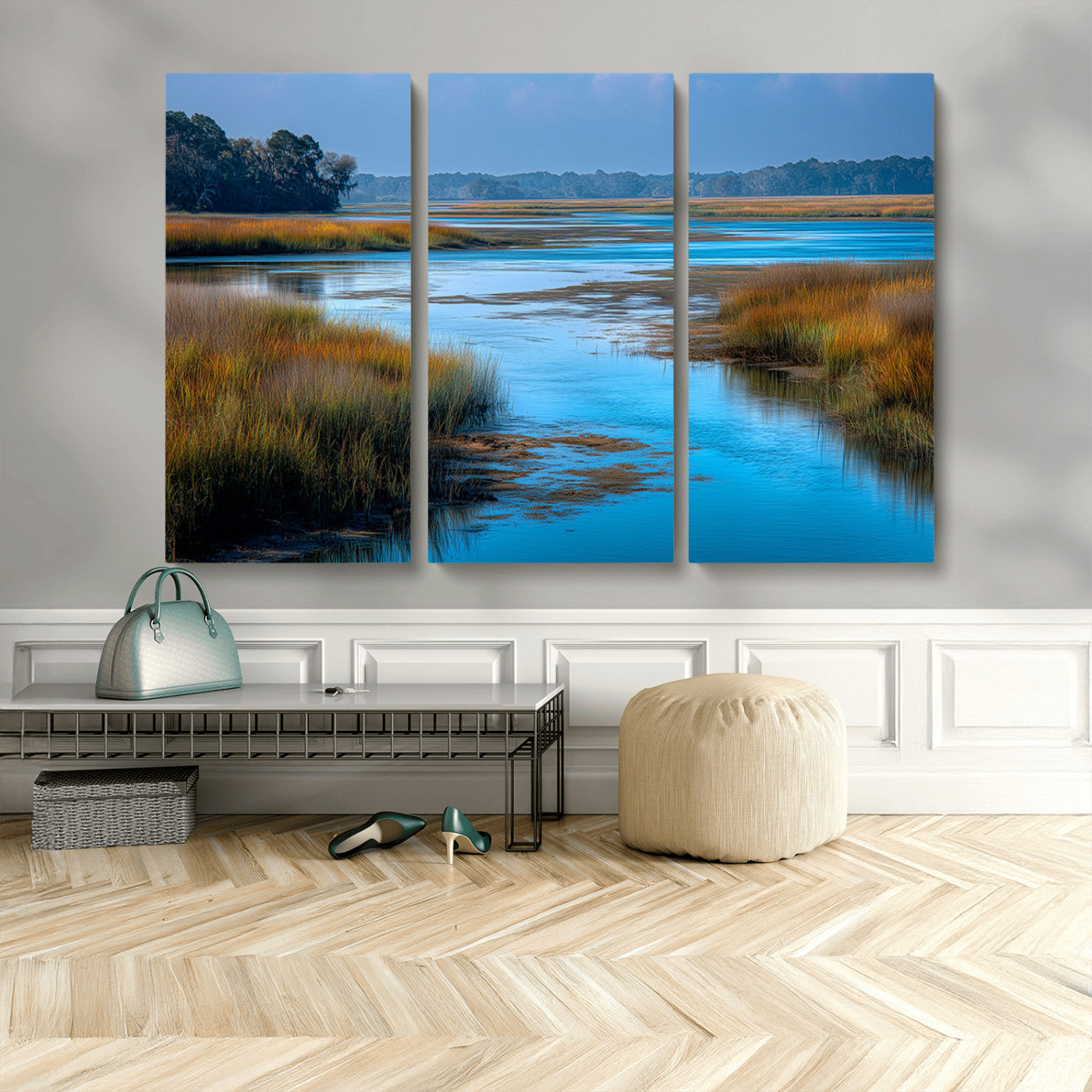 A peaceful marshland scene with calm blue water reflecting the surrounding grasses and trees, capturing the beauty of nature in a serene landscape.