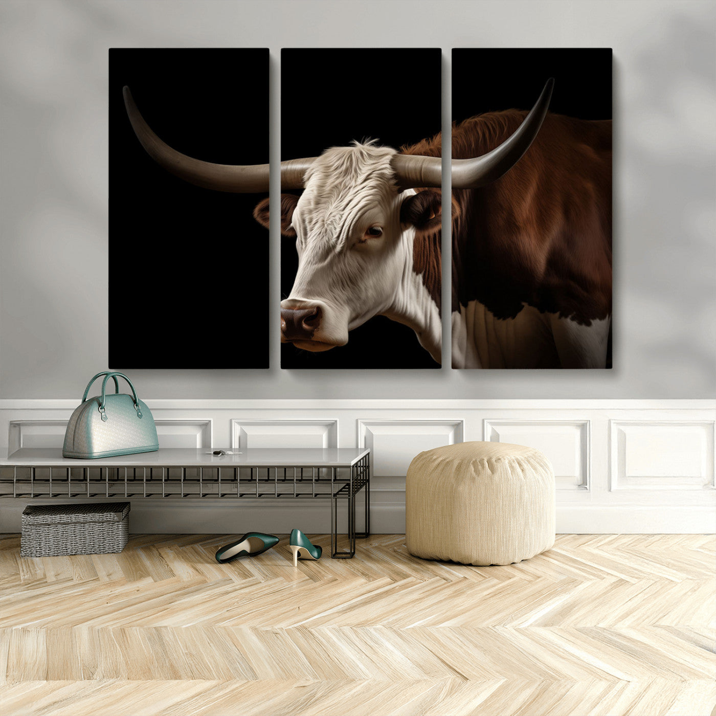 "Close-up of a brown and white longhorn cow with prominent curved horns against a black background."
