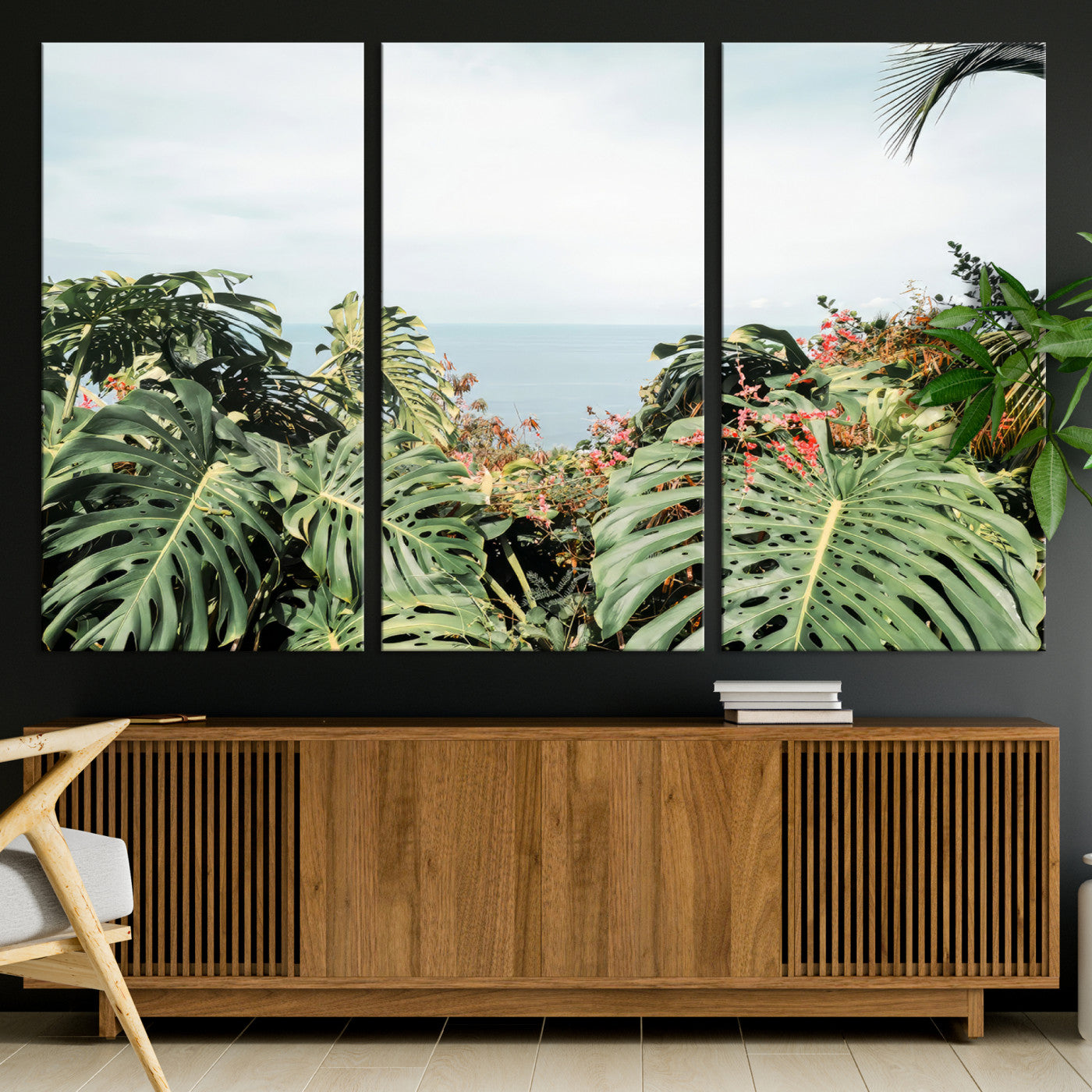Monstera leaves and tropical flowers framing a calm ocean view, ideal for tropical coastal or exotic jungle-style interior wall decor.