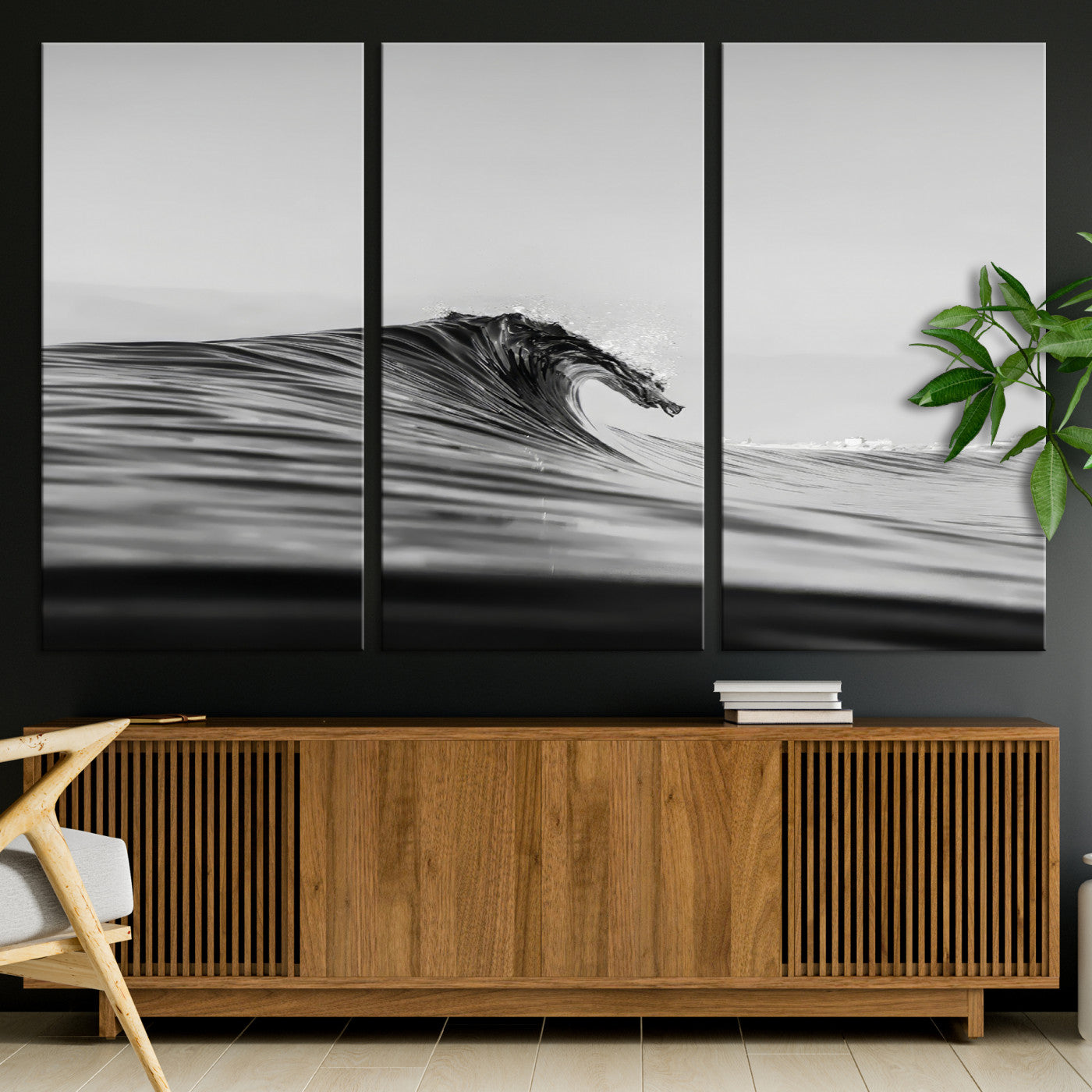 Striking black and white photo of a curling wave, ideal for modern coastal or minimalist wall decor settings.