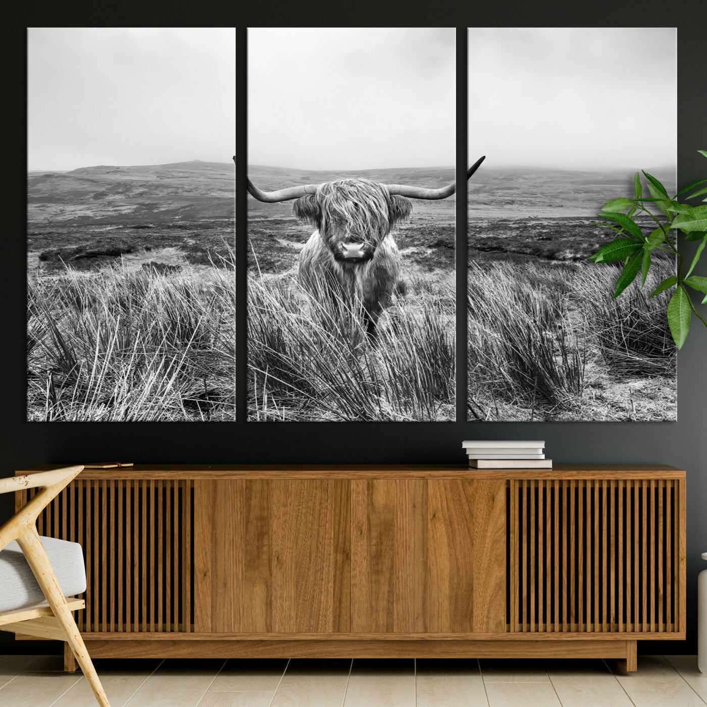A black and white portrait of a Highland cow in a foggy Scottish countryside, capturing a rustic aesthetic and tranquil farm escape.