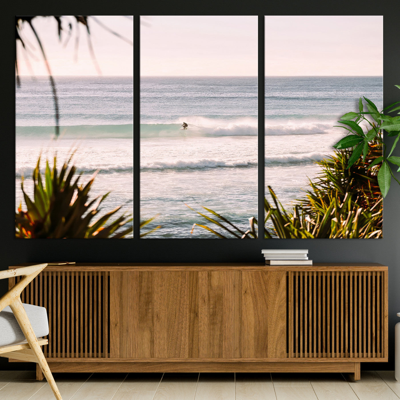 Canvas of a lone surfer riding a pastel wave at sunrise, perfect for tropical or coastal-themed spaces with a relaxed, airy vibe.