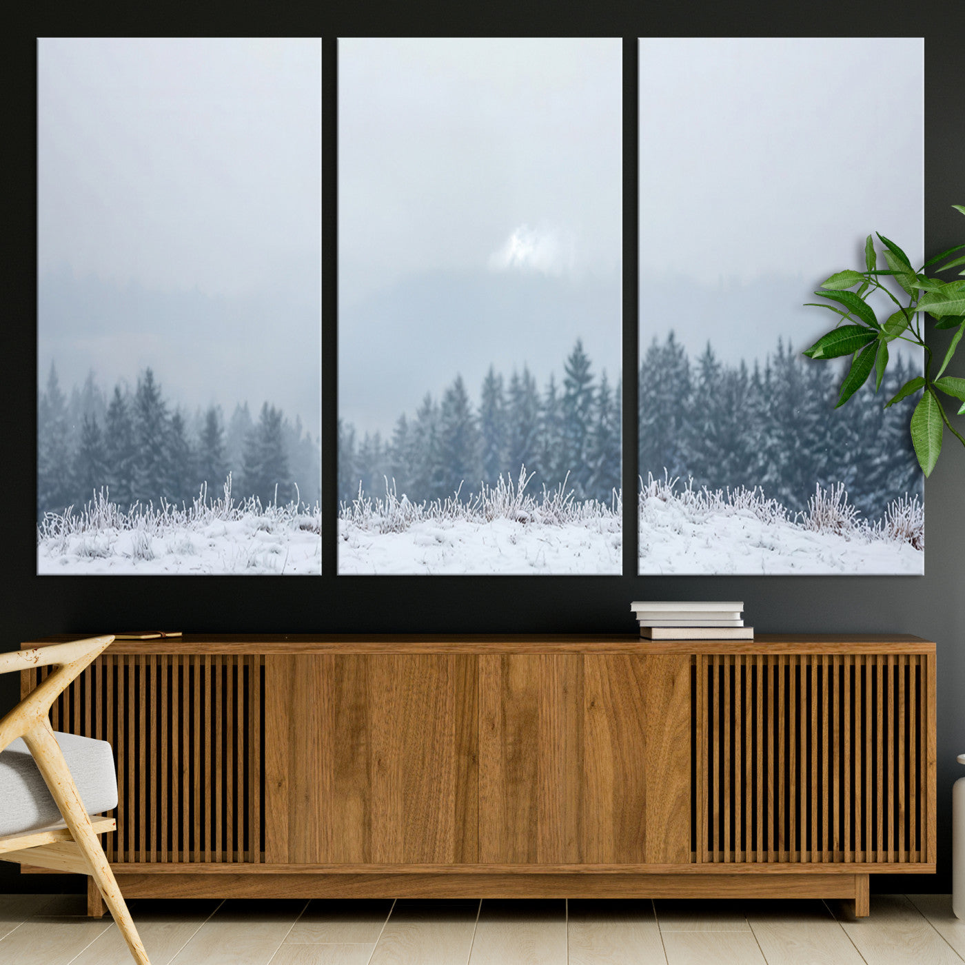 Snow-covered forest under misty sky, soft light breaking through clouds, ideal for minimalist or Nordic-inspired home decor.