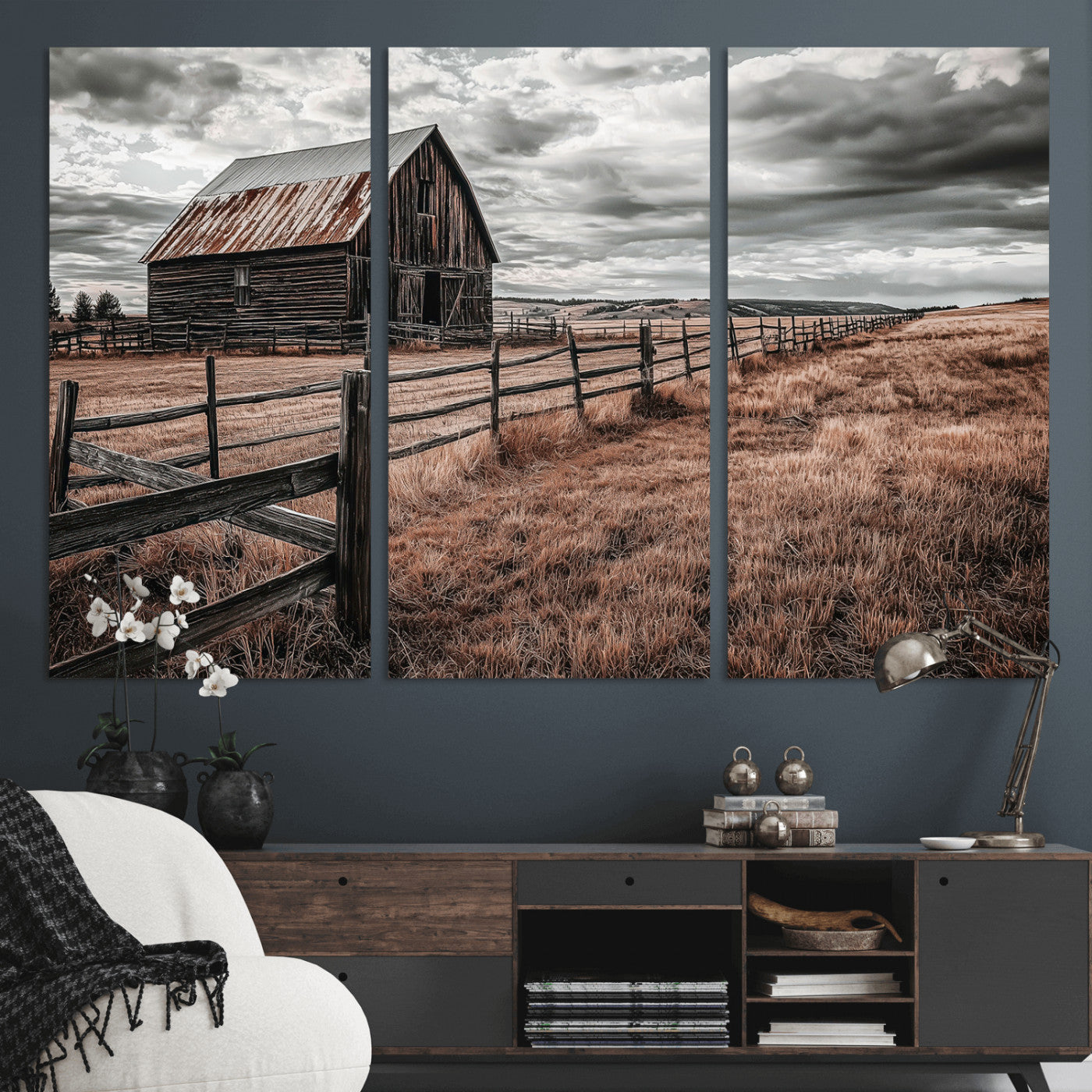 Framed canvas of a rustic barn under a moody sky with weathered fence and dark fields, ideal for farmhouse or rural-style wall decor.