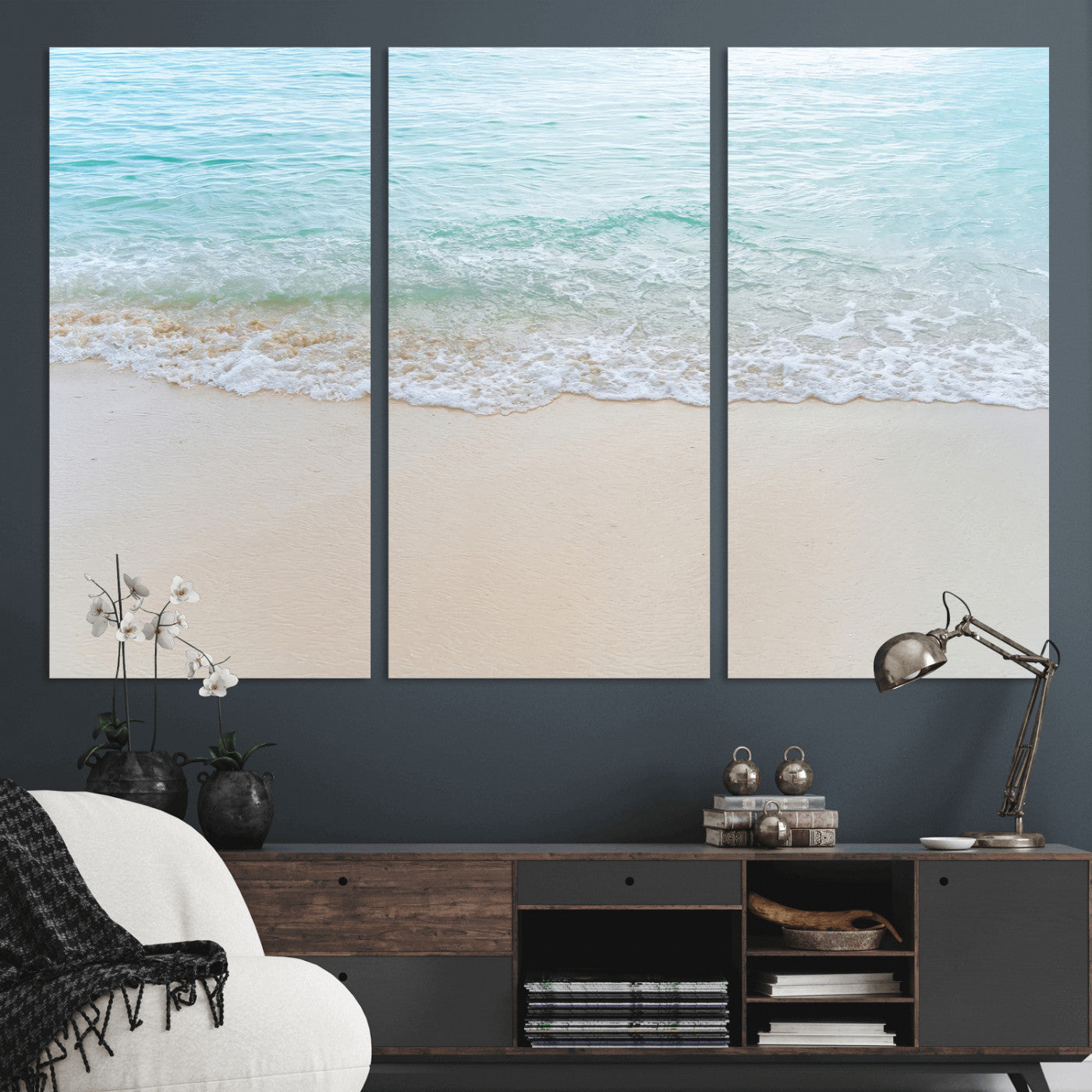 Soft shoreline with gentle aqua waves on smooth sand, ideal for minimalist coastal or pastel ocean-inspired home wall decor.