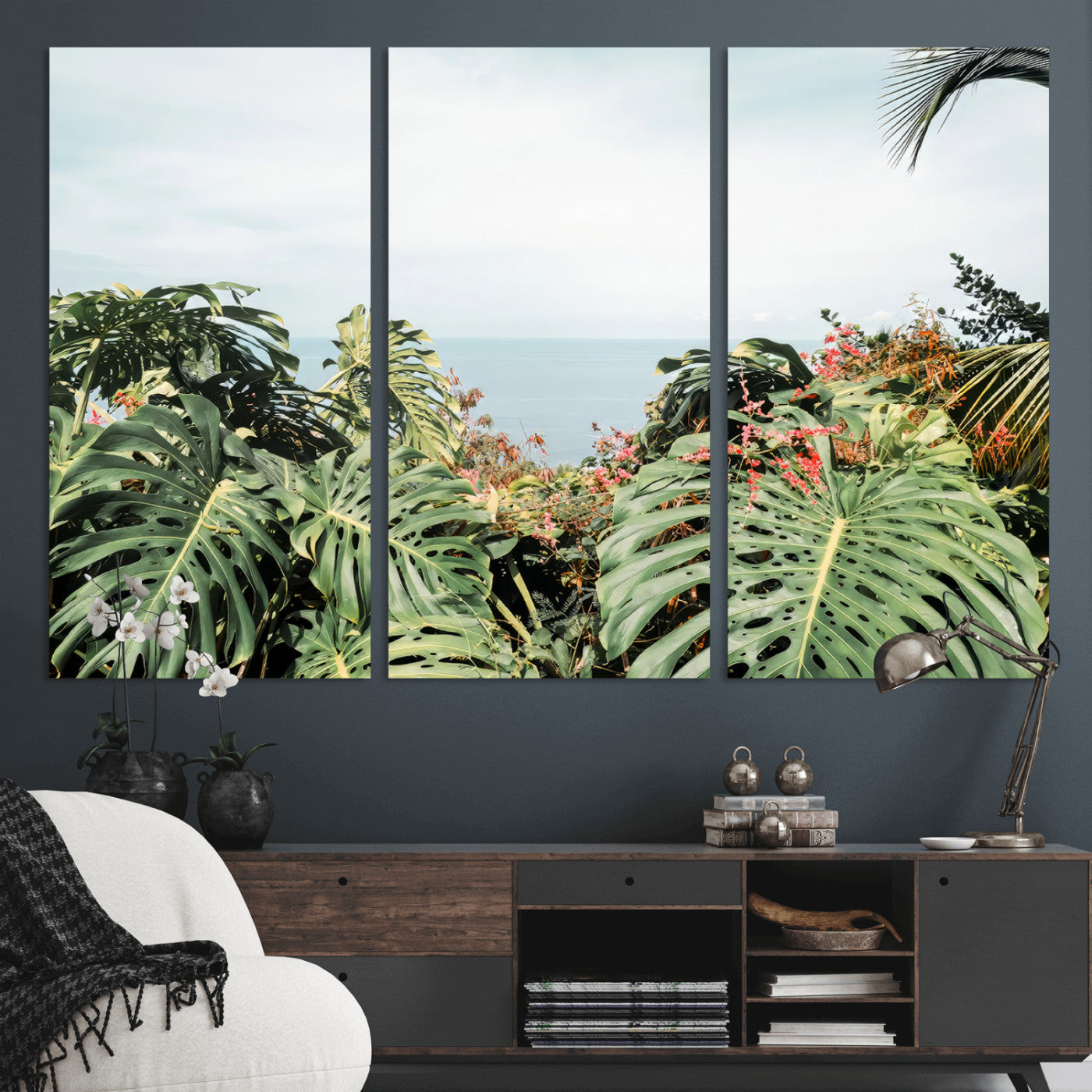Monstera leaves and tropical flowers framing a calm ocean view, ideal for tropical coastal or exotic jungle-style interior wall decor.