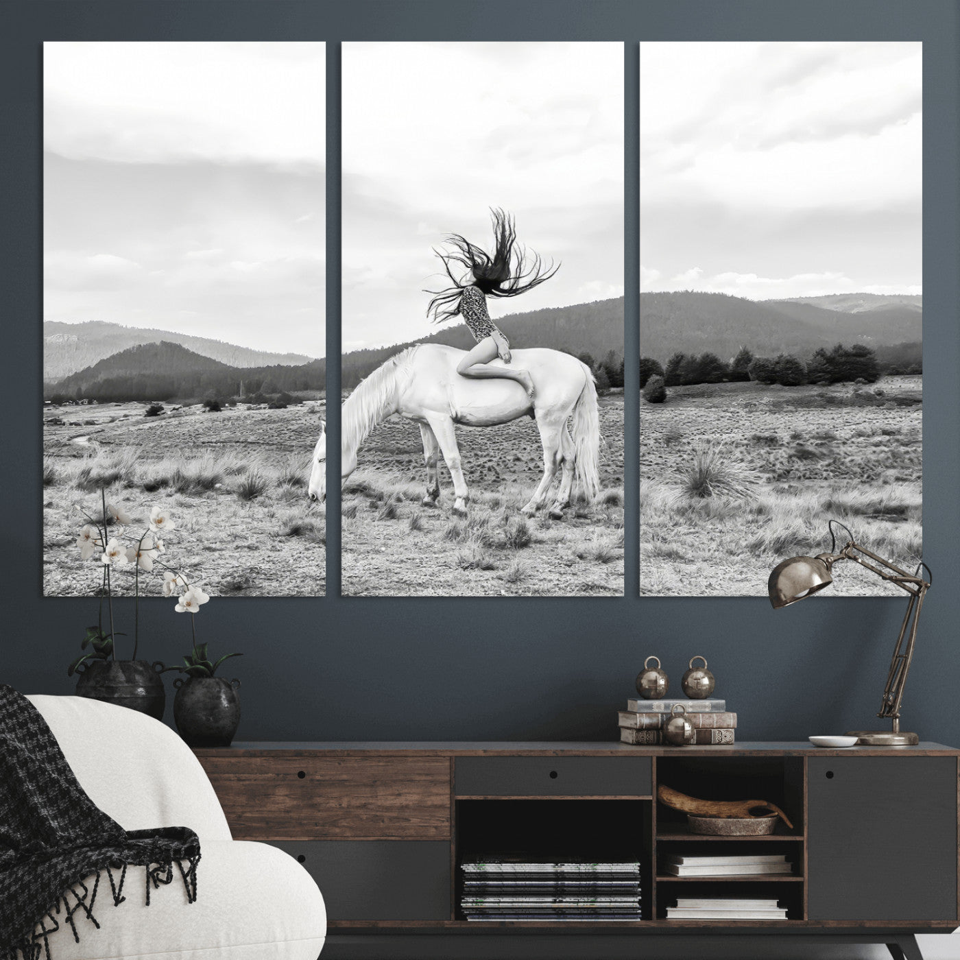 Black and white photo of a woman on a white horse in moody tones, ideal for Western Boho or modern rustic-style home decor.
