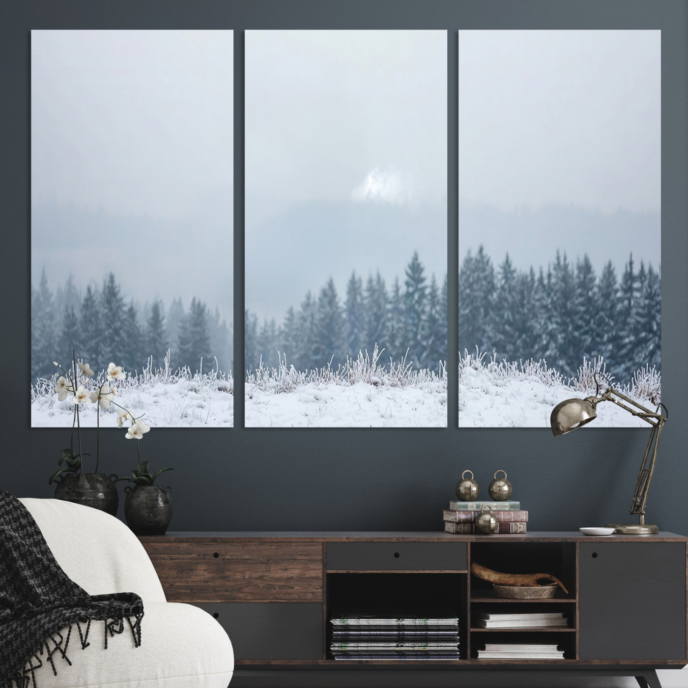 Snow-covered forest under misty sky, soft light breaking through clouds, ideal for minimalist or Nordic-inspired home decor.