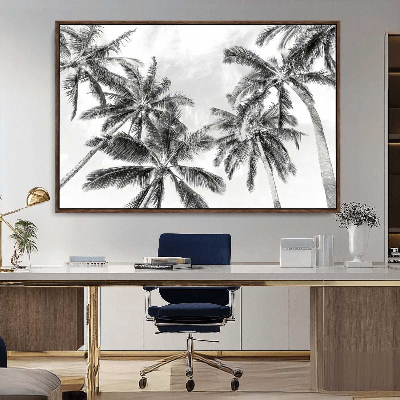 Black and white tropical palm trees viewed from below, swaying gently against a bright sky, creating a serene and elegant coastal atmosphere.