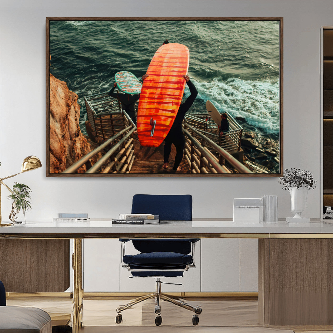 A surfer carrying a bold orange surfboard down a rugged staircase toward the ocean, bathed in golden hour light, capturing the energy of coastal adventure.