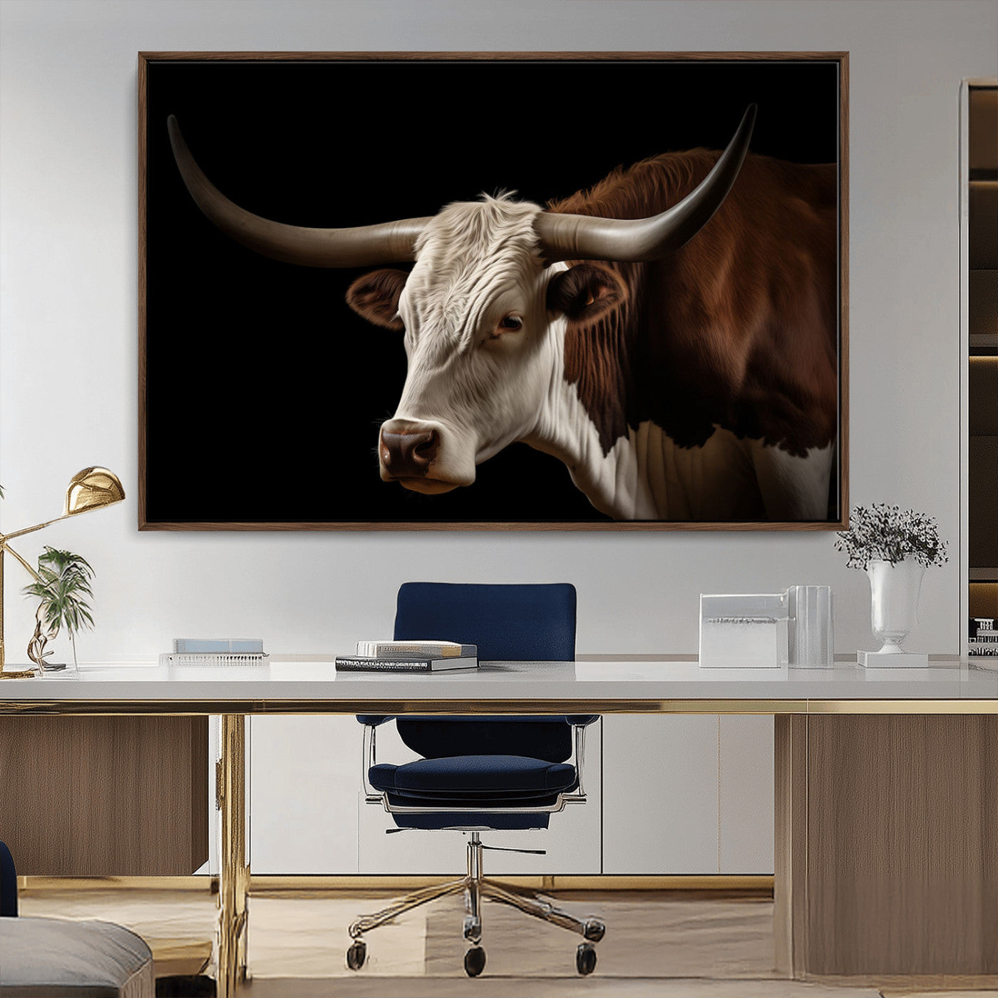 "Close-up of a brown and white longhorn cow with prominent curved horns against a black background."