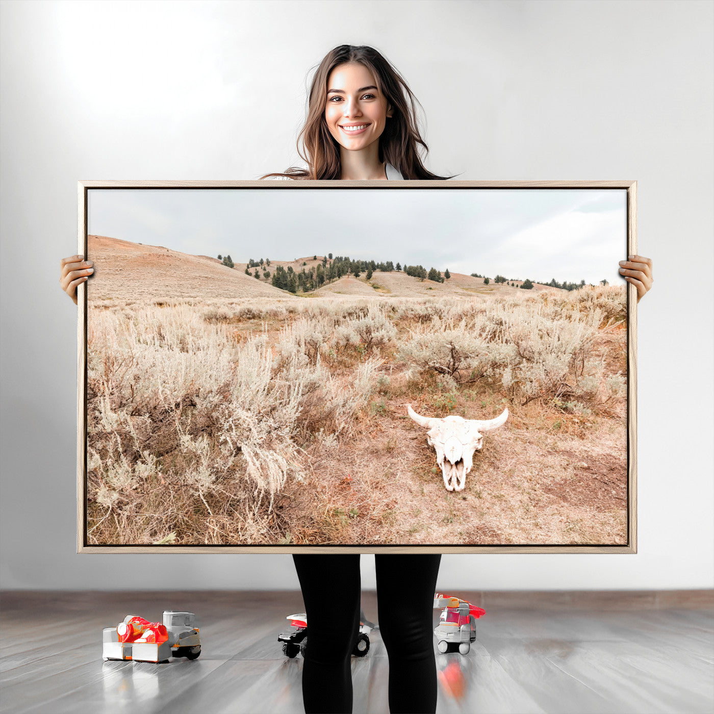 Rustic bull skull on dry sagebrush field under soft light, ideal for western minimal or desert prairie-style wall decoration.