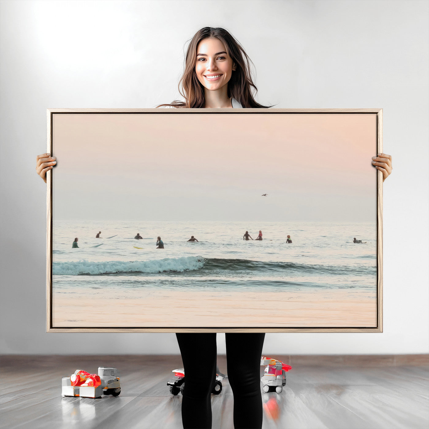 Dreamy photo of surfers waiting on soft pastel waves under a pink sunset sky, ideal for soft coastal minimalist or serene ocean-themed home decor.