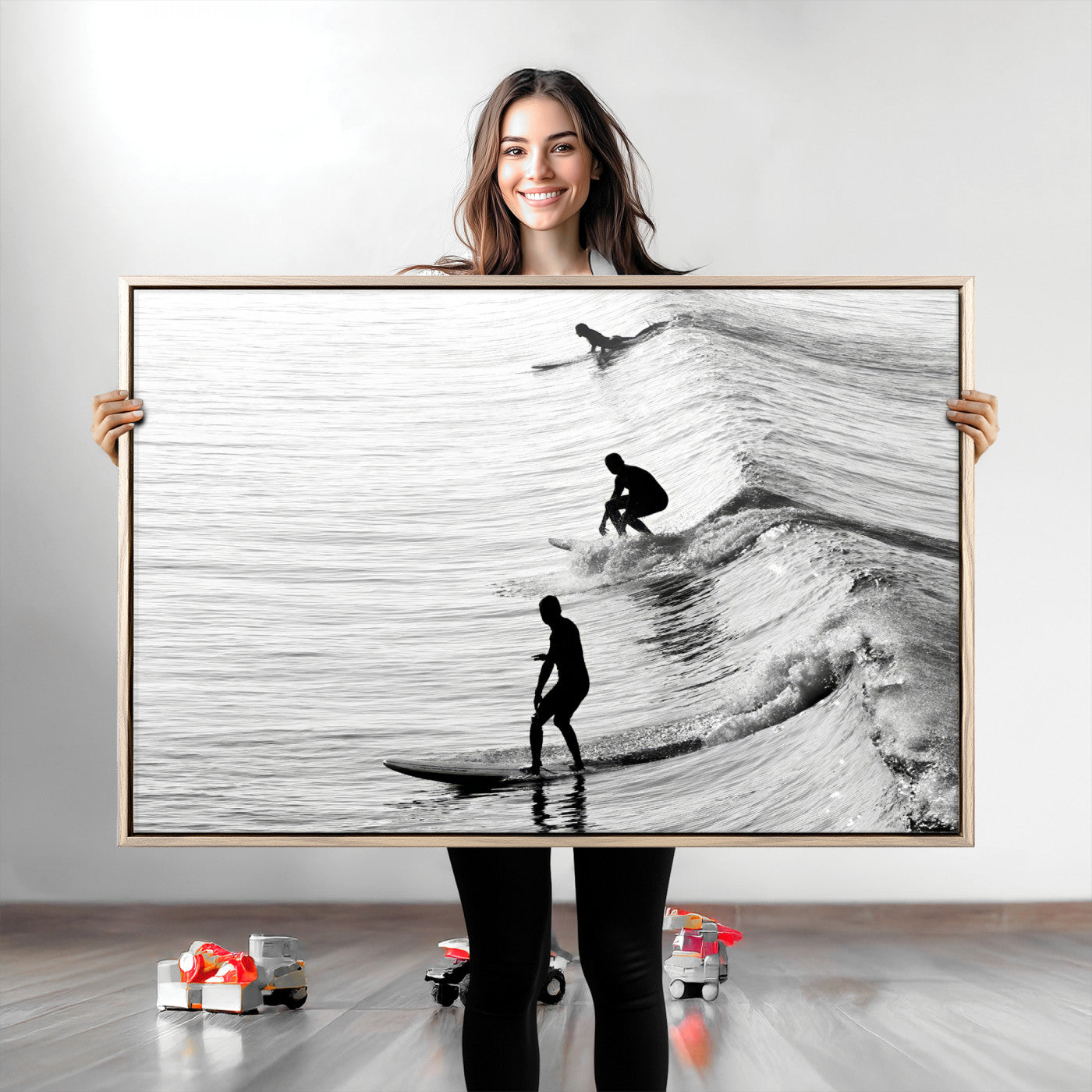 Black and white photo of surfers riding waves in a moody, high-contrast scene, ideal for modern coastal or surf-inspired home decor.