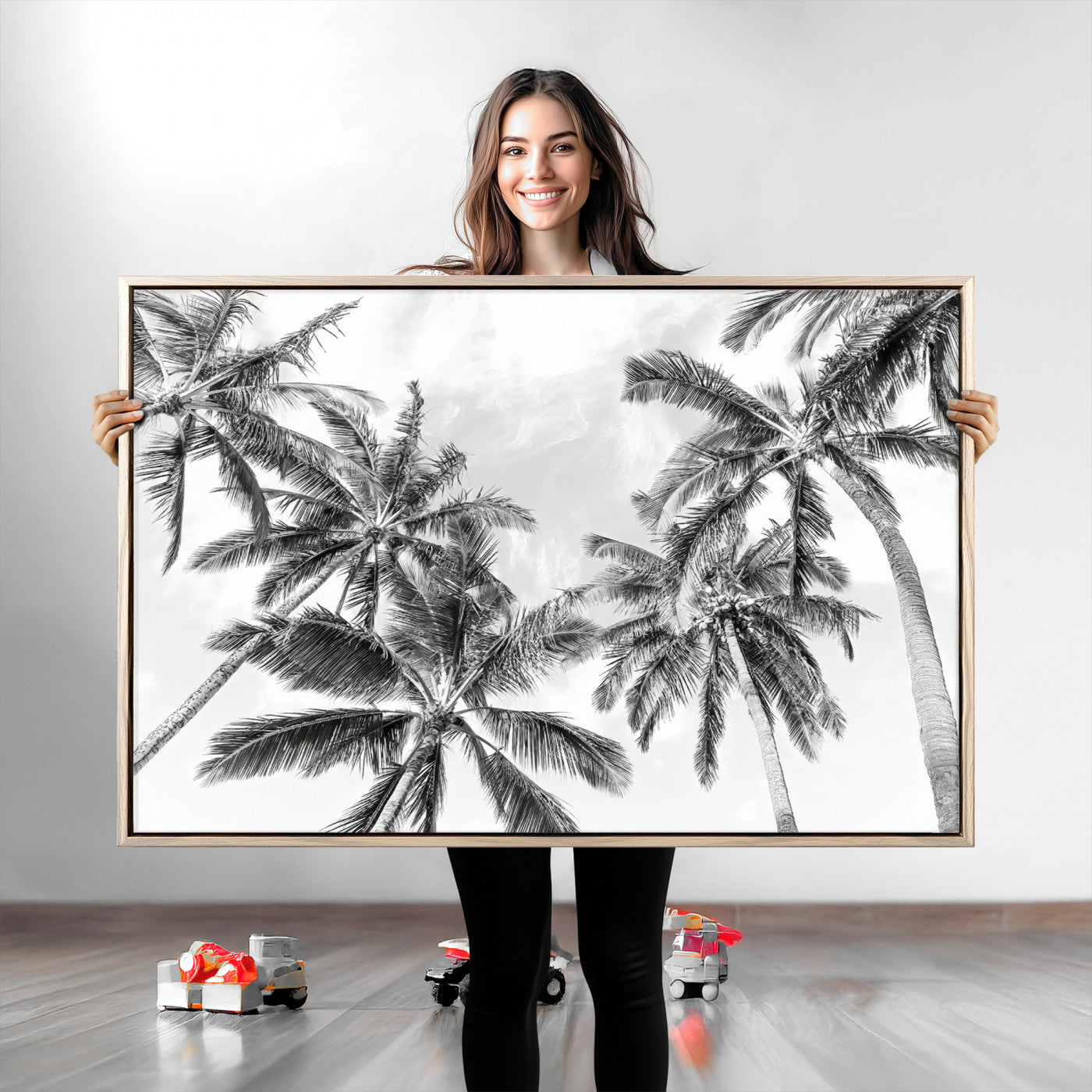 Black and white tropical palm trees viewed from below, swaying gently against a bright sky, creating a serene and elegant coastal atmosphere.