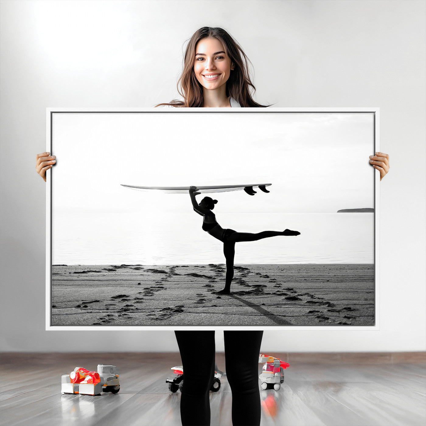 A woman balances a surfboard on her head while striking a yoga pose on the beach, silhouetted against a calm ocean horizon.
