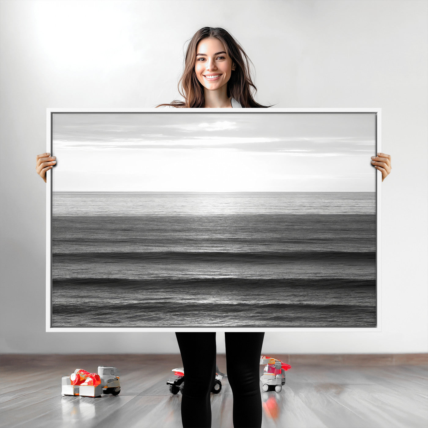 Minimalist black and white ocean view with layered waves reflecting sunlight, evoking a sense of calm and coastal serenity.