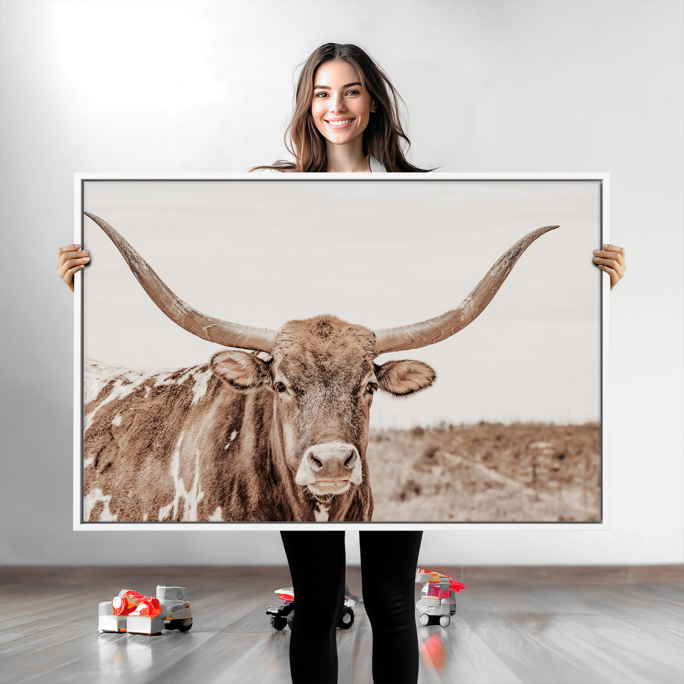 A longhorn cow in soft beige desert tones, standing calmly in open land, perfect for neutral western or rustic farmhouse interiors.