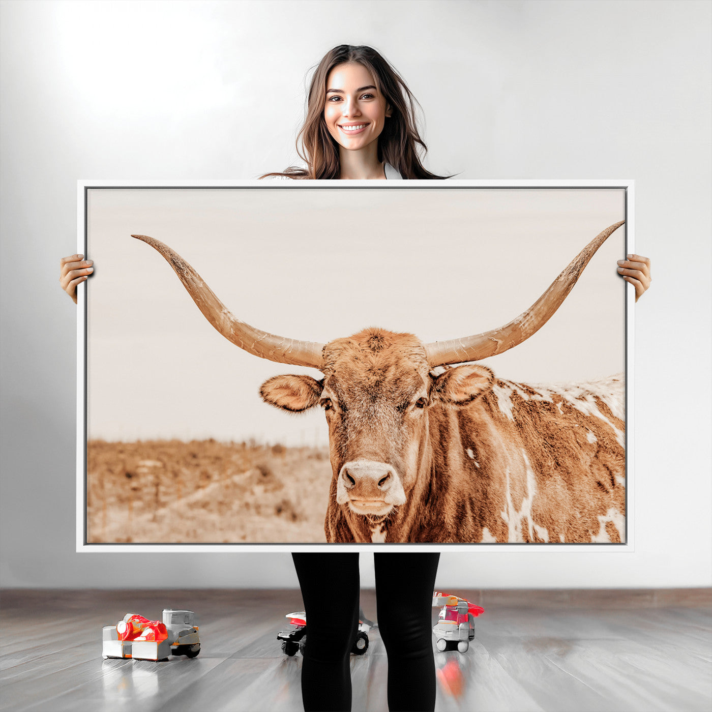 A longhorn bull standing proudly in a sunlit desert field with warm neutral tones, ideal for rustic western or farmhouse interiors.