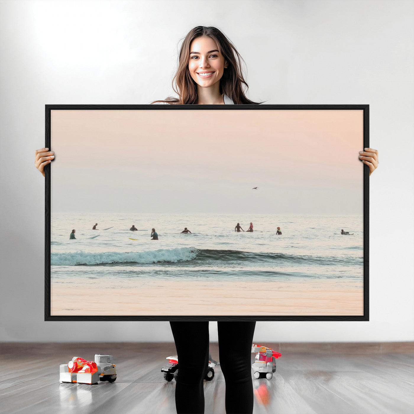 Dreamy photo of surfers waiting on soft pastel waves under a pink sunset sky, ideal for soft coastal minimalist or serene ocean-themed home decor.