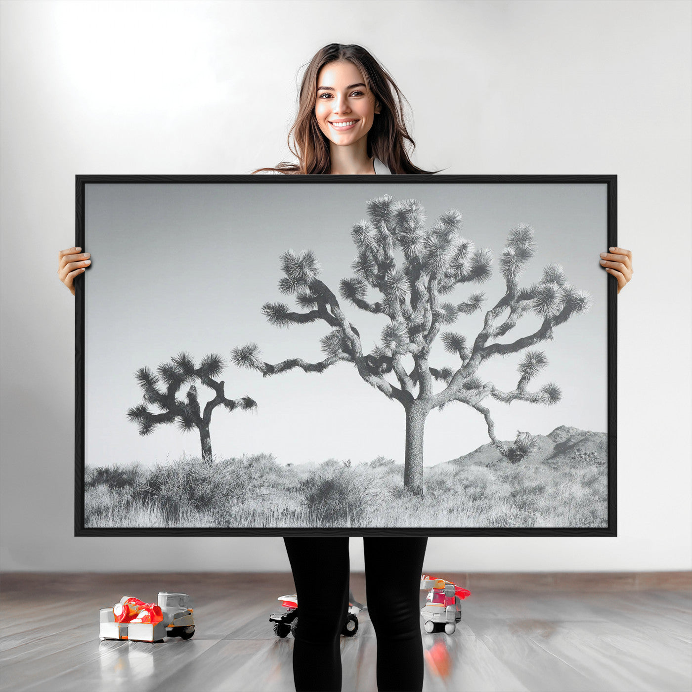 Black and white Joshua tree in a desert landscape with soft light and dry brush, perfect for rustic or minimalist home decor.