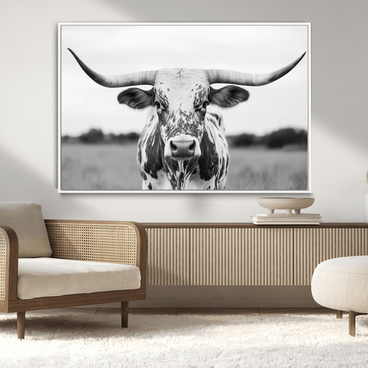 Capture the strength and elegance of nature with this striking black and white portrait of a longhorn cow. Its powerful presence makes a bold statement in any room.