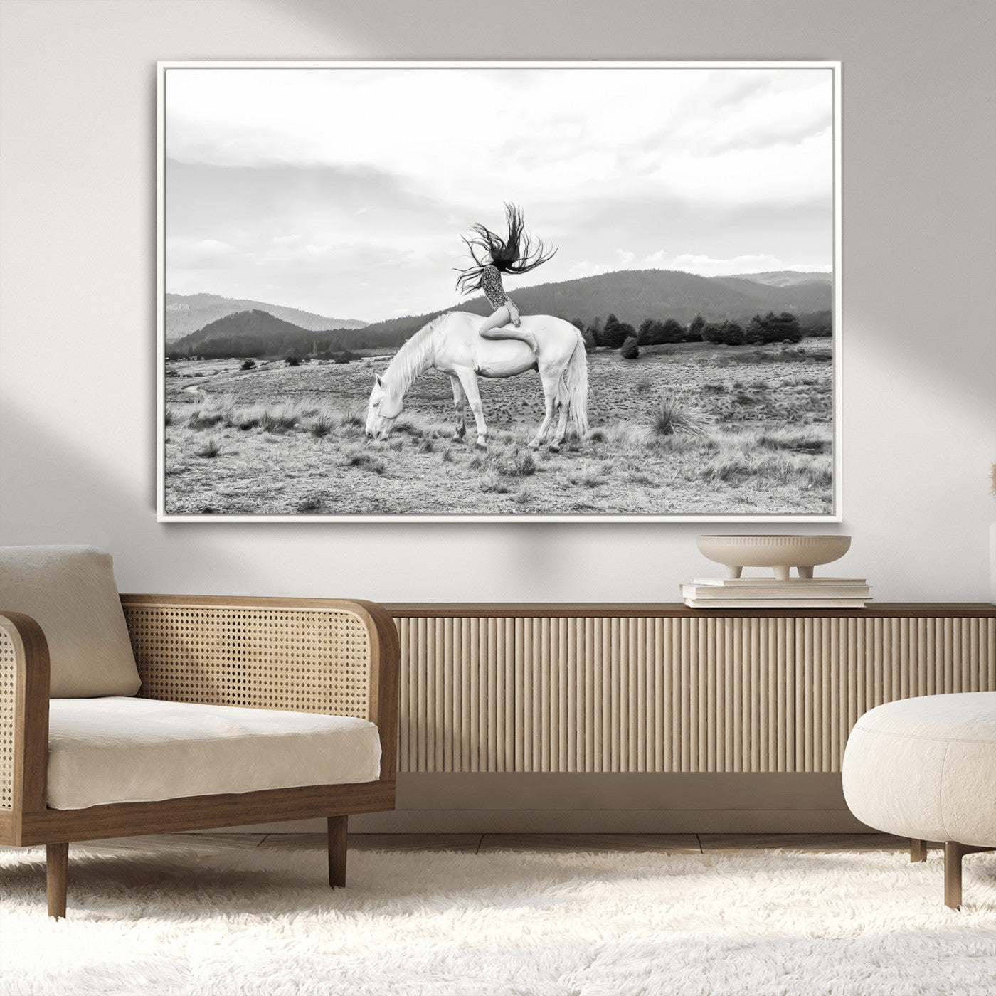 Black and white photo of a woman on a white horse in moody tones, ideal for Western Boho or modern rustic-style home decor.