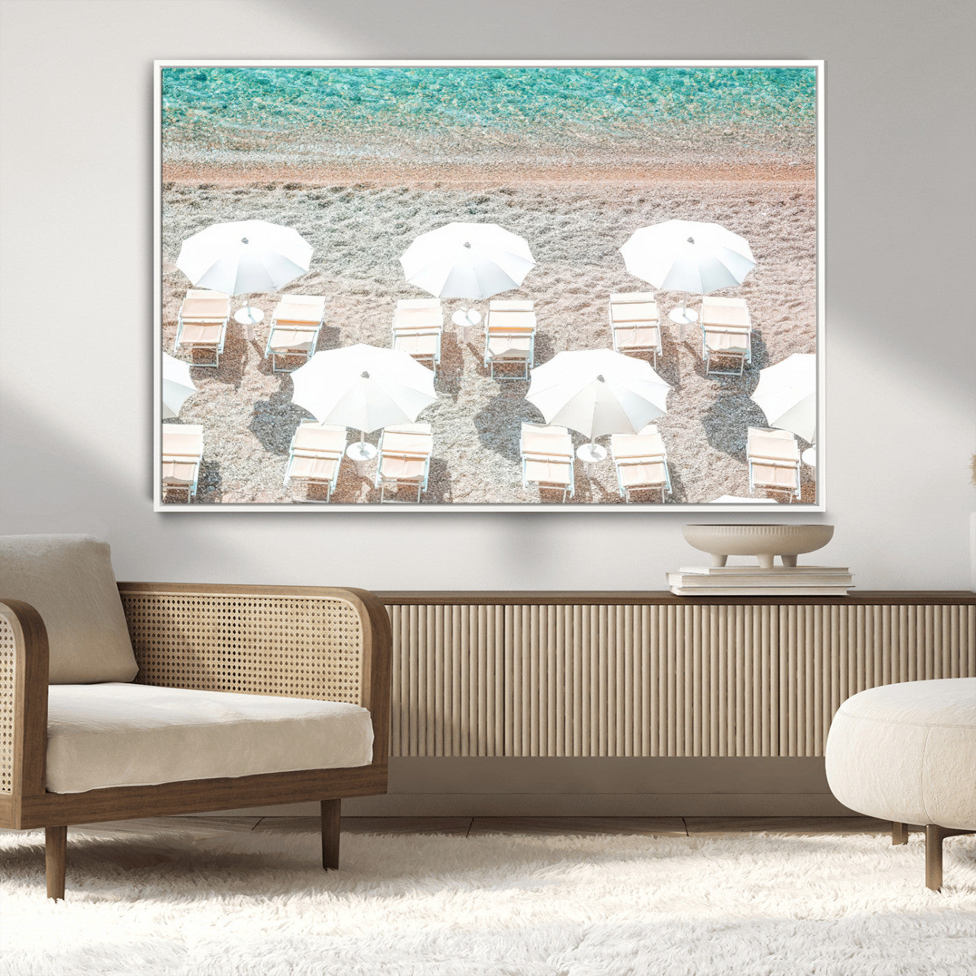 A bright beach scene with white umbrellas, pastel sand, and turquoise waters, creating a tranquil coastal vibe, perfect for beach house or summer decor.