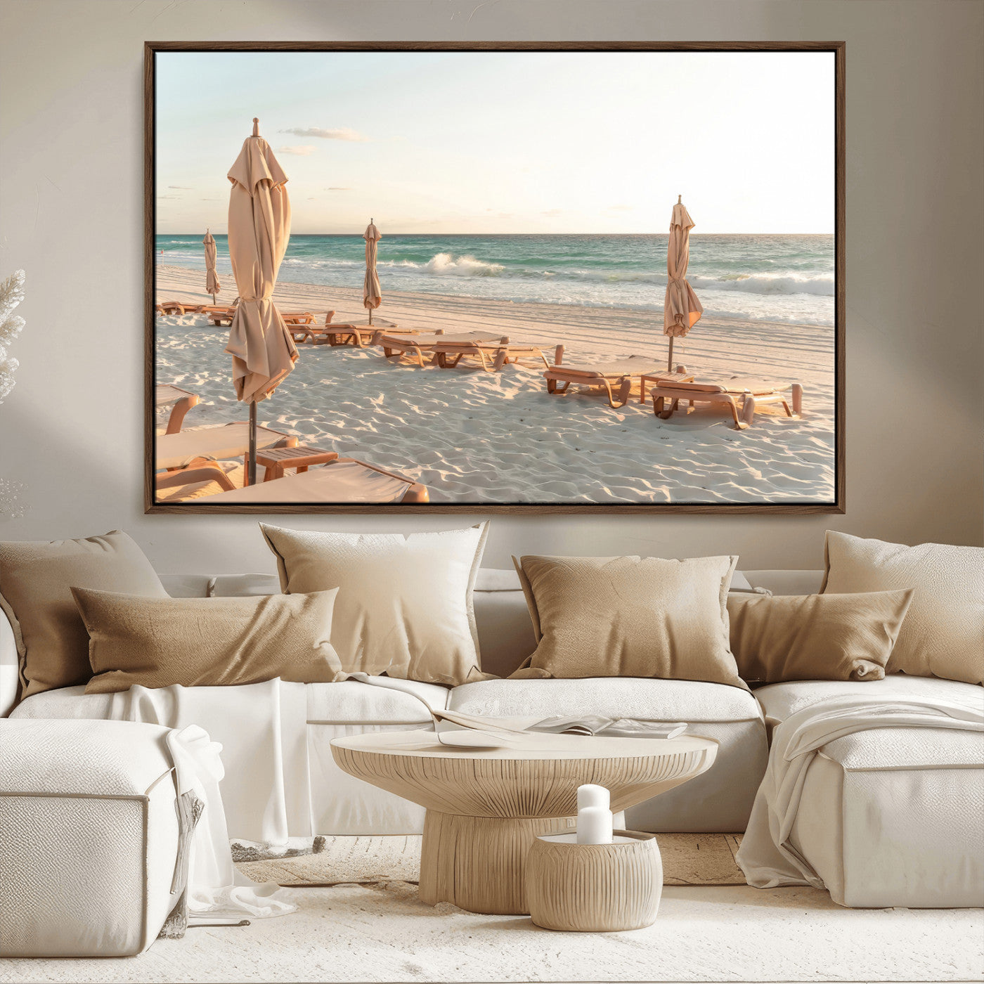 Minimalist photo of empty beach loungers and umbrellas on soft sand, ideal for calm seaside or pastel coastal-style home decor.