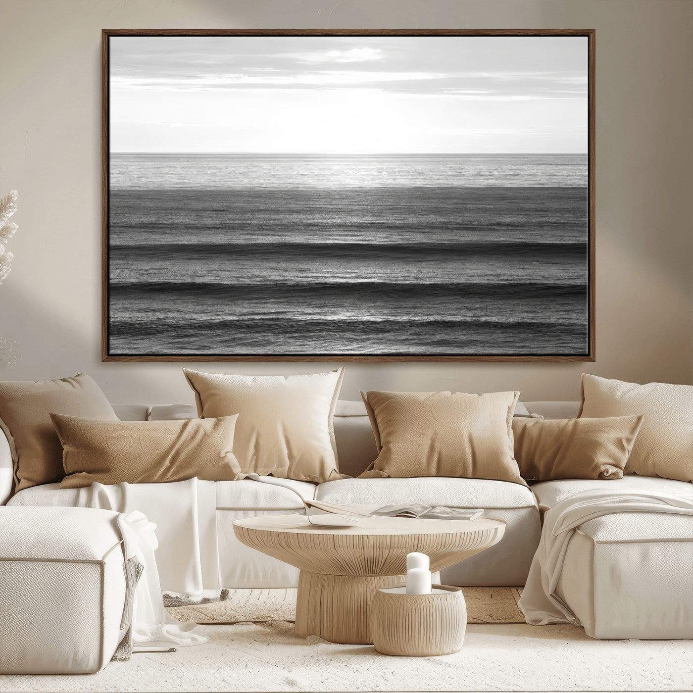 Minimalist black and white ocean view with layered waves reflecting sunlight, evoking a sense of calm and coastal serenity.