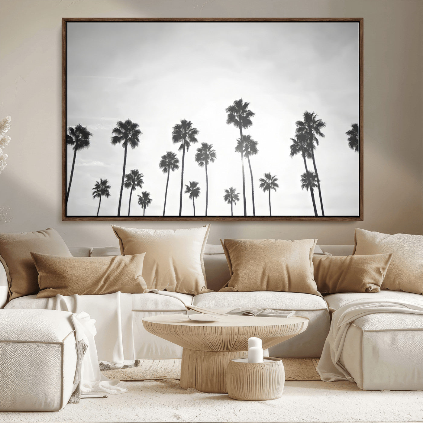 A black and white minimalist scene featuring tall palm trees silhouetted against a bright sky, creating a dreamy and timeless tropical aesthetic.