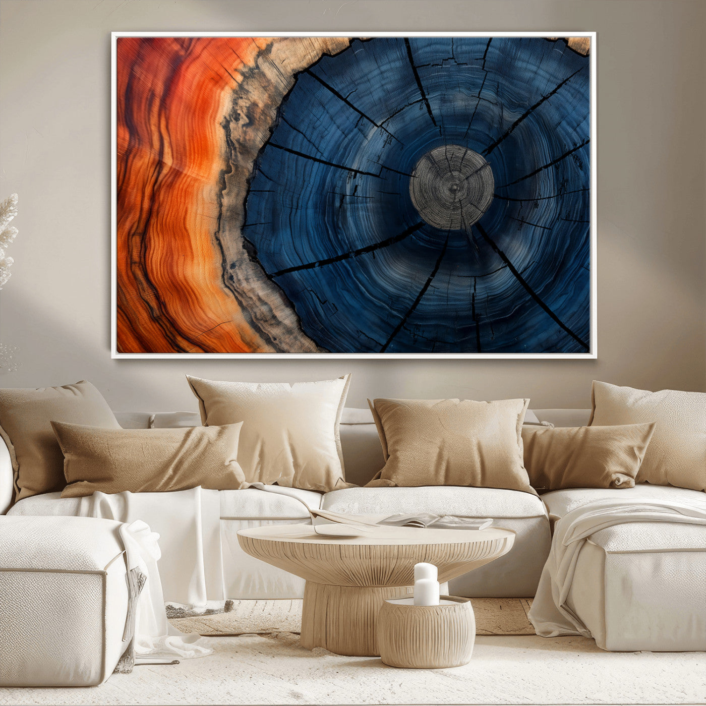 A captivating close-up of a tree trunk, showcasing its concentric rings in rich shades of blue, orange, and brown, highlighting the organic patterns of natural wood.