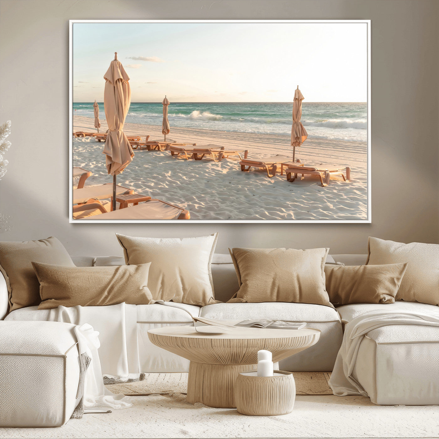 Minimalist photo of empty beach loungers and umbrellas on soft sand, ideal for calm seaside or pastel coastal-style home decor.